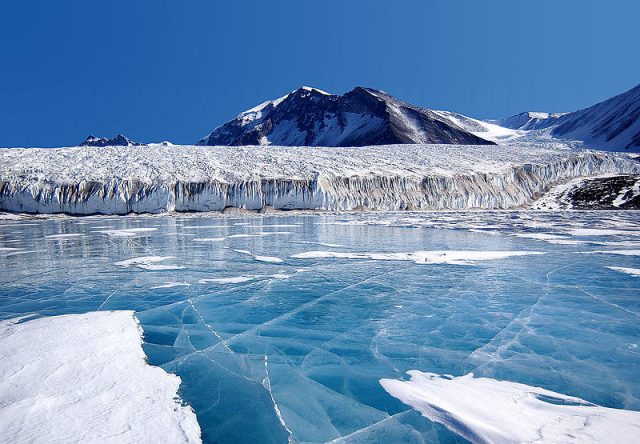 The blue ice covering Lake Fryxell, in the Transantarctic Mountains, comes from glacial meltwater from the Canada Glacier and other smaller glaciers.