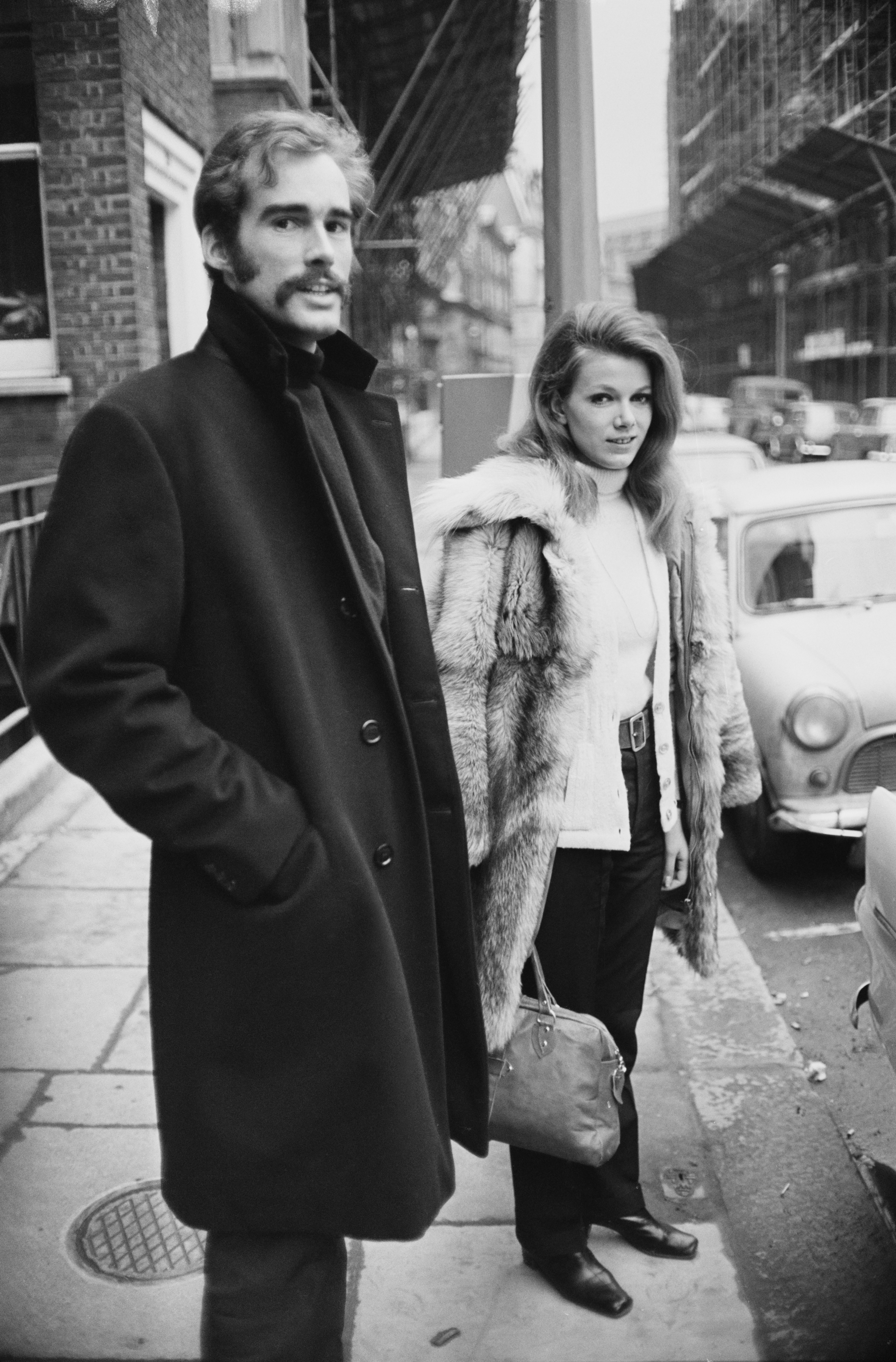 American actor and freelance photojournalist Sean Flynn (1941 - 1971) with his girlfriend Elizabeth, UK, 12th February 1968. (Photo by Len Trievnor/Daily Express/Getty Images)