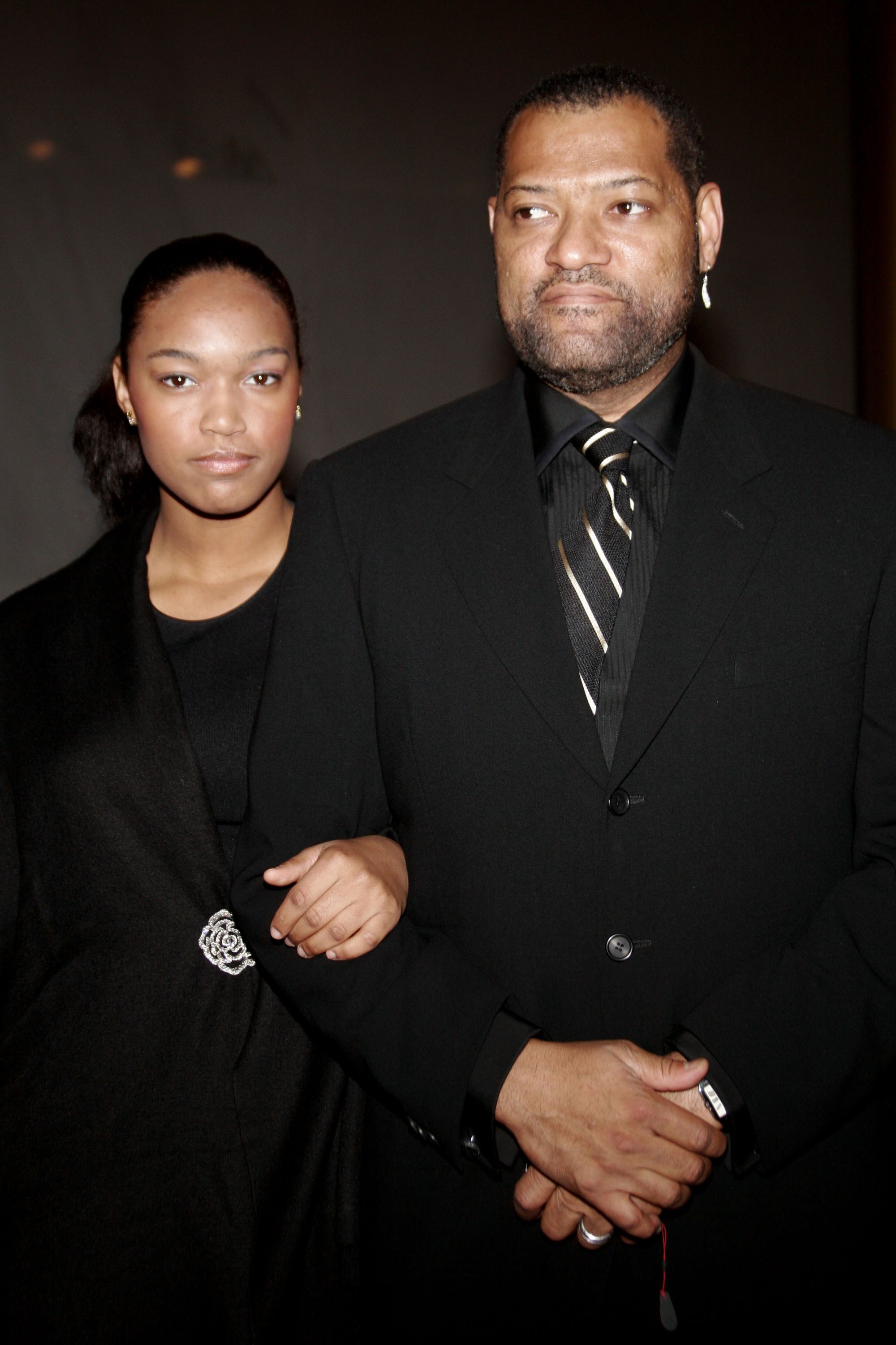 WASHINGTON - NOVEMBER 13:  Laurence Fishburne and his daughter Montana arrive at the National Dream Gala to celebrate the Martin Luther King Jr. Memorial groundbreaking November 13, 2006 in Washington, DC.  (Photo by Nancy Ostertag/Getty Images)