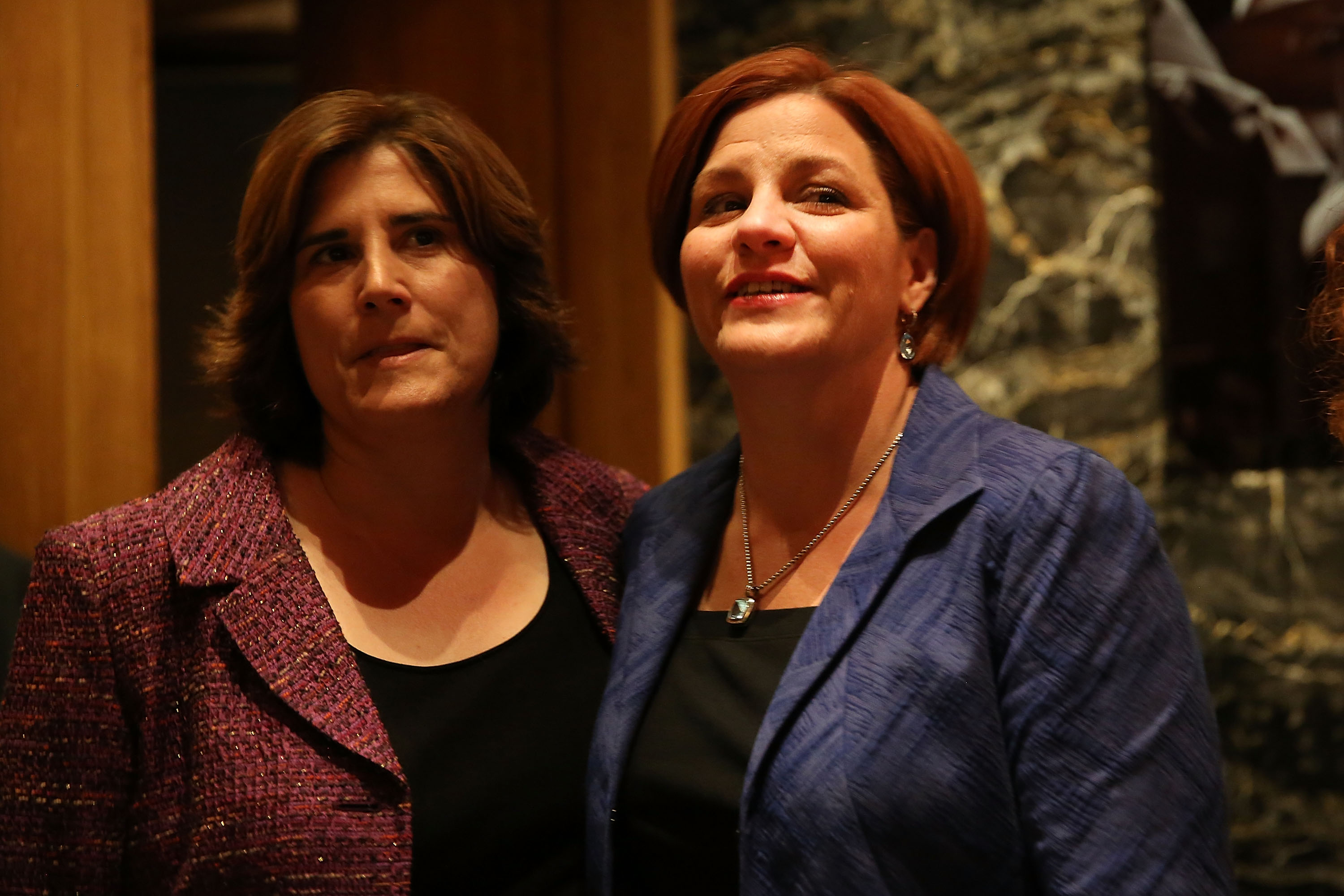 NEW YORK, NY - SEPTEMBER 10: New York City Council Speaker Christine Quinn (R) stands backstage with her wife Kim Catullo moments before conceding defeat in the New York Democratic mayoral primary elections on September 10, 2013 in New York City. Quinn, who lead early in the polls and who was endorsed by all of New York