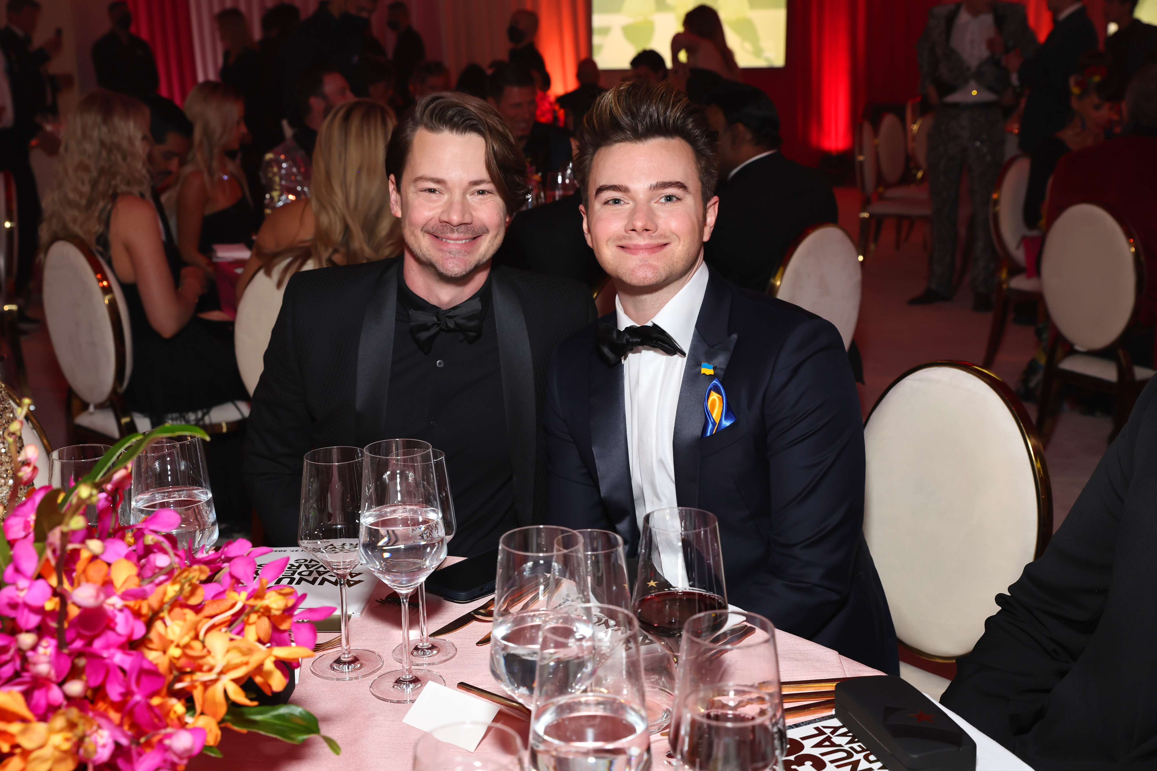 WEST HOLLYWOOD, CALIFORNIA - MARCH 27: (L-R) Will Sherrod and Chris Colfer attend the Elton John AIDS Foundation