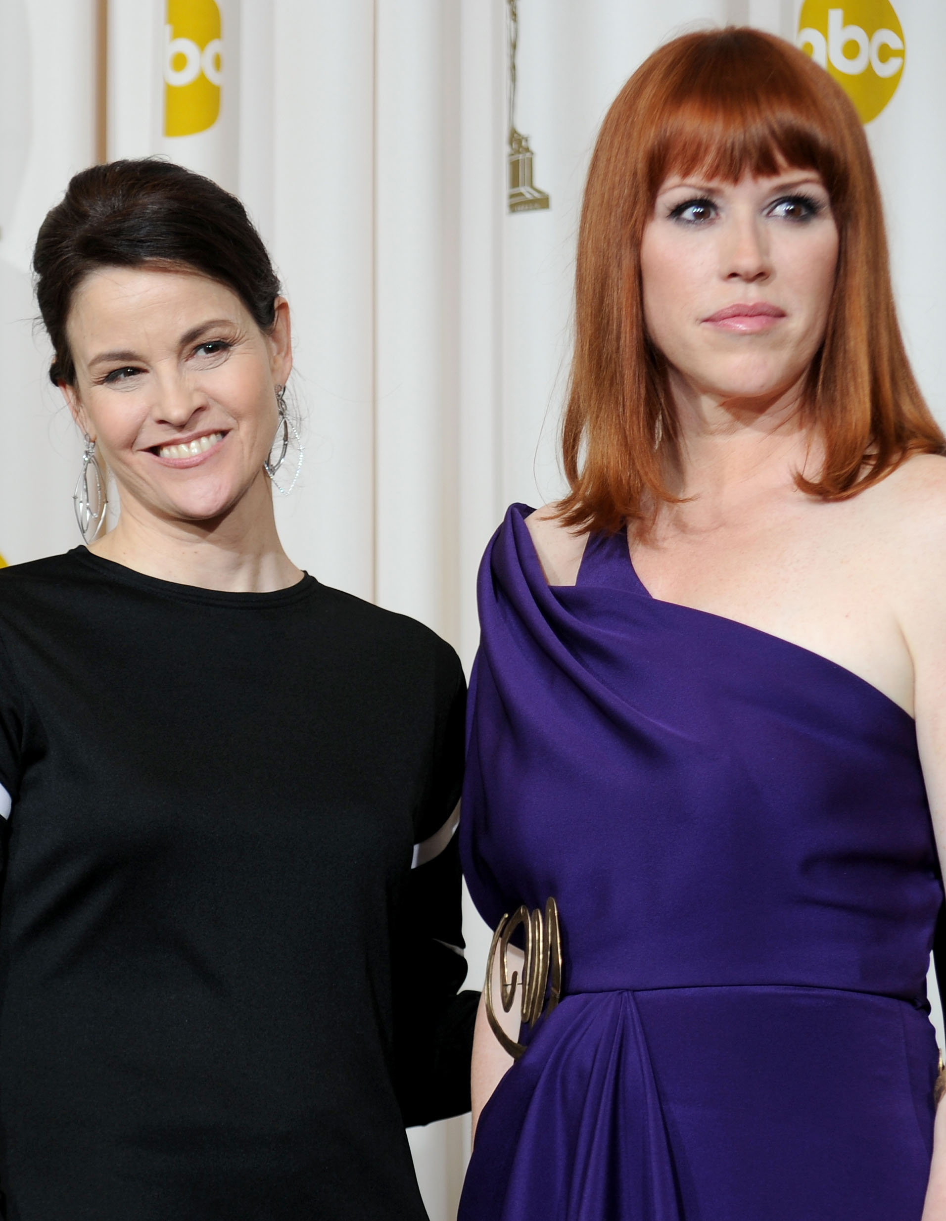 HOLLYWOOD - MARCH 07:  (EDITORS NOTE: NO ONLINE, NO INTERNET, EMBARGOED FROM INTERNET AND TELEVISION USAGE UNTIL THE CONCLUSION OF THE LIVE OSCARS TELECAST)  Actresses Ally Sheedy and Molly Ringwald, who presented a tribute to late director John Hughes, pose in the press room at the 82nd Annual Academy Awards held at Kodak Theatre on March 7, 2010 in Hollywood, California.  (Photo by Jason Merritt/Getty Images)
