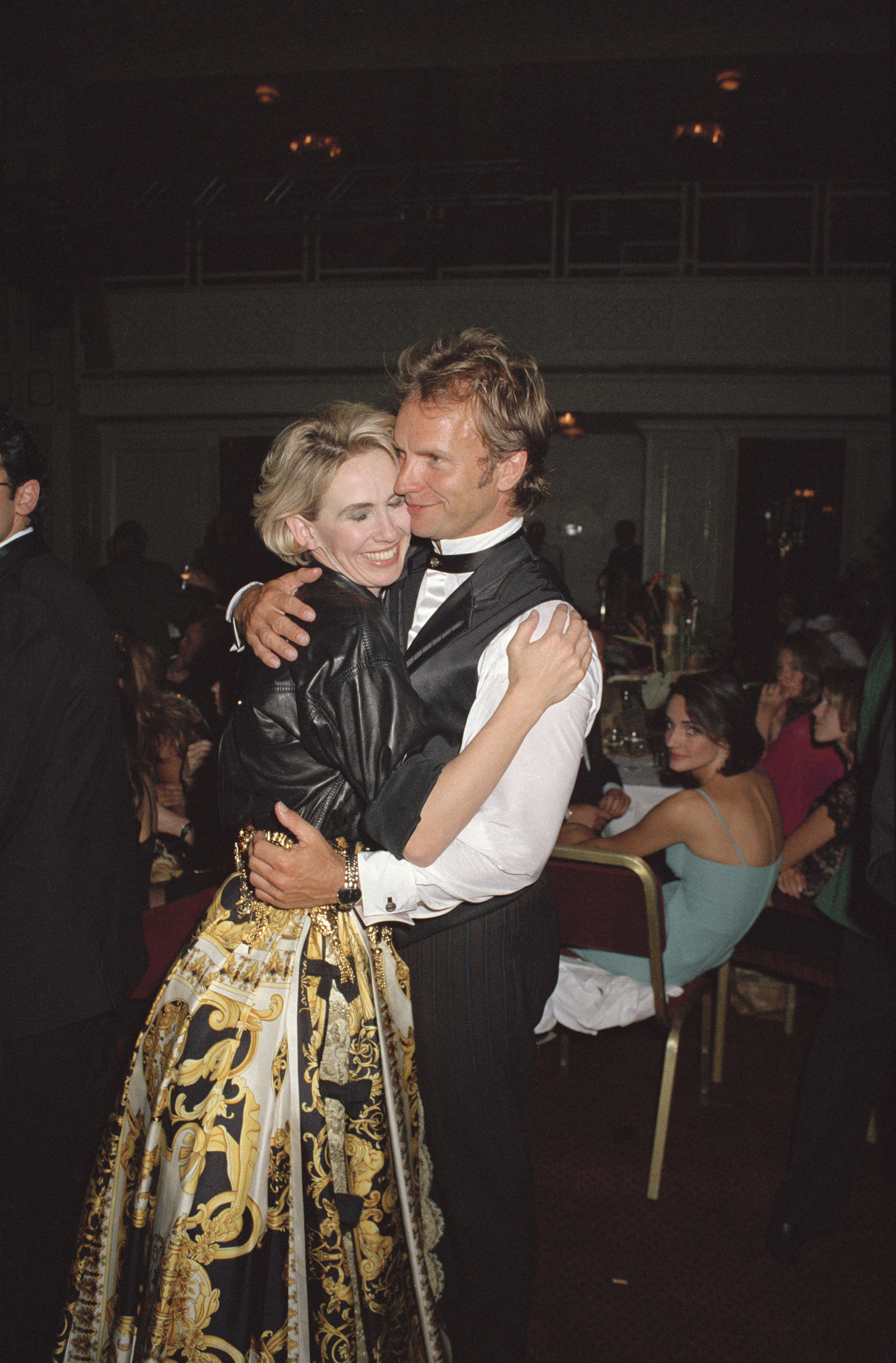 LONDON, ENGLAND - MAY 31:  Singer and musician Sting and his partner Trudie Styler attend The Rhythm of Life Fashion Ball in aid of the Rainforest Foundation at the Grosvenor House Hotel on May 31, 1992 in London, England. The event was hosted by rainforest campaigners Sting and Trudie Styler. (Photo by Dave Benett/Getty Images)