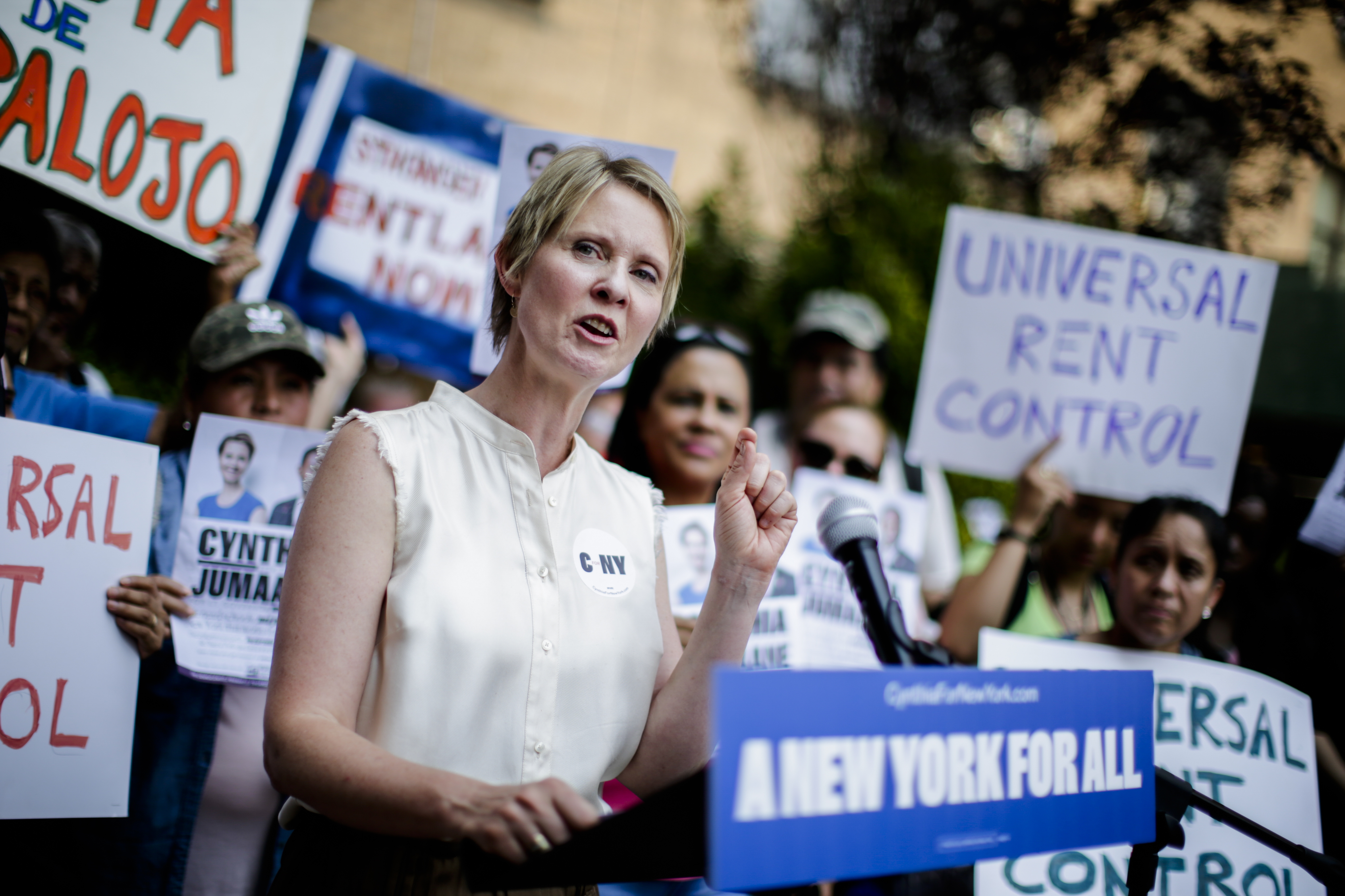 NEW YORK, NY - AUGUST 16: Democratic gubernatorial candidate Cynthia Nixon speaks to attendees during a rally for universal rent control on August 16, 2018 in New York City. Cynthia Nixon, who is running against Gov. Andrew M. Cuomo for the governor seat has pushed for a more response to high rents, also, Nixon has said that cities throughout the state should be allowed to impose it. Only NYC and some nearby areas are allowed to impose rent control, and only on apartments built before 1974. (Photo by Eduardo Munoz Alvarez/Getty Images)