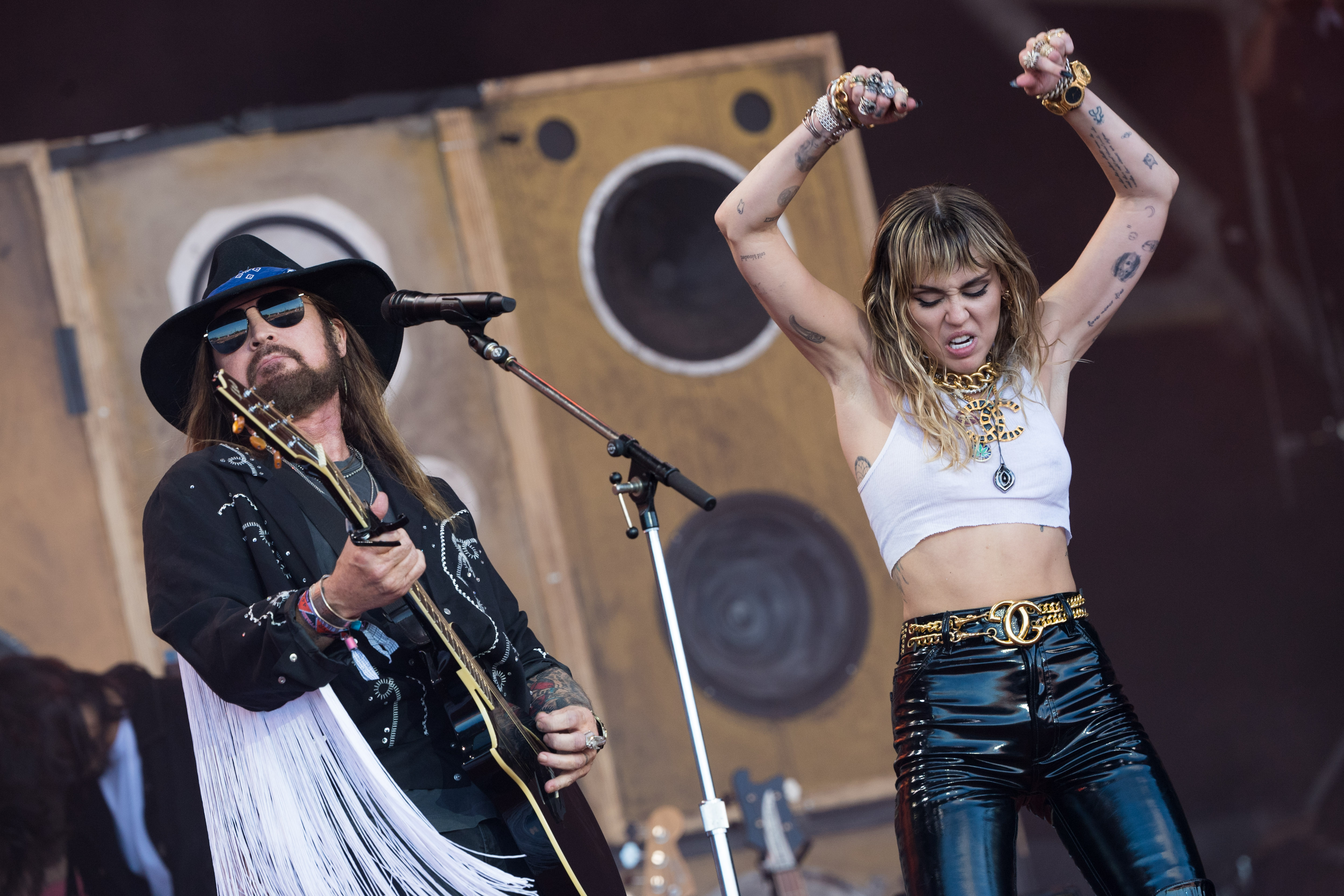 GLASTONBURY, ENGLAND - JUNE 30: Billy Ray Cyrus and Miley Cyrus perform on the Pyramid stage on day five of Glastonbury Festival at Worthy Farm, Pilton on June 30, 2019 in Glastonbury, England. (Photo by Ian Gavan/Getty Images)