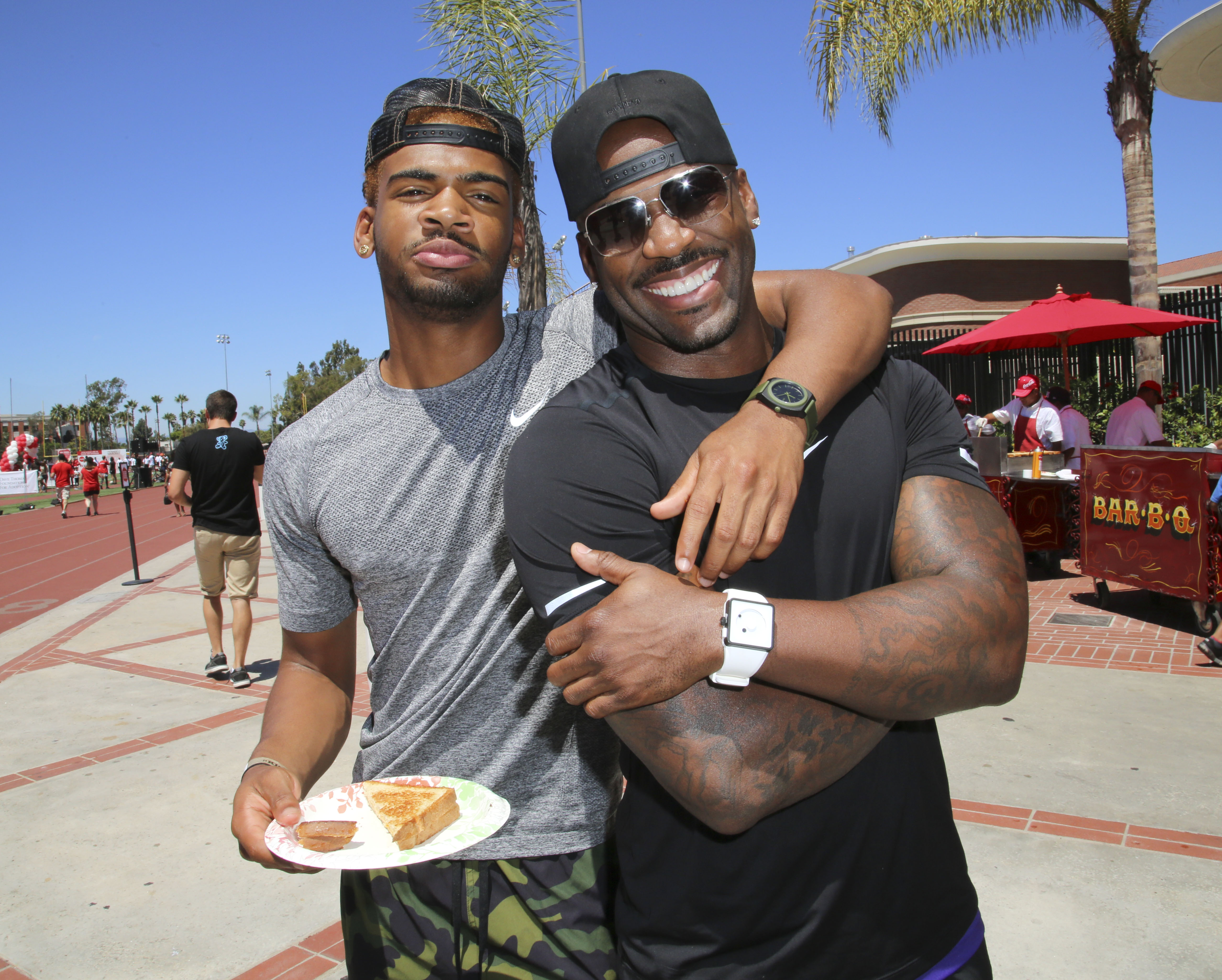 LOS ANGELES, CA - AUGUST 16:  Trainer Dolvett Quince (R) and his son Isiah (L) attend Kickball For A Home - Celebrity Challenge Presented By Dave Thomas Foundation For Adoption at the University of Southern California on August 16, 2014 in Los Angeles, California.  (Photo by Rachel Murray/Getty Images for Dave Thomas Foundation for Adoption)