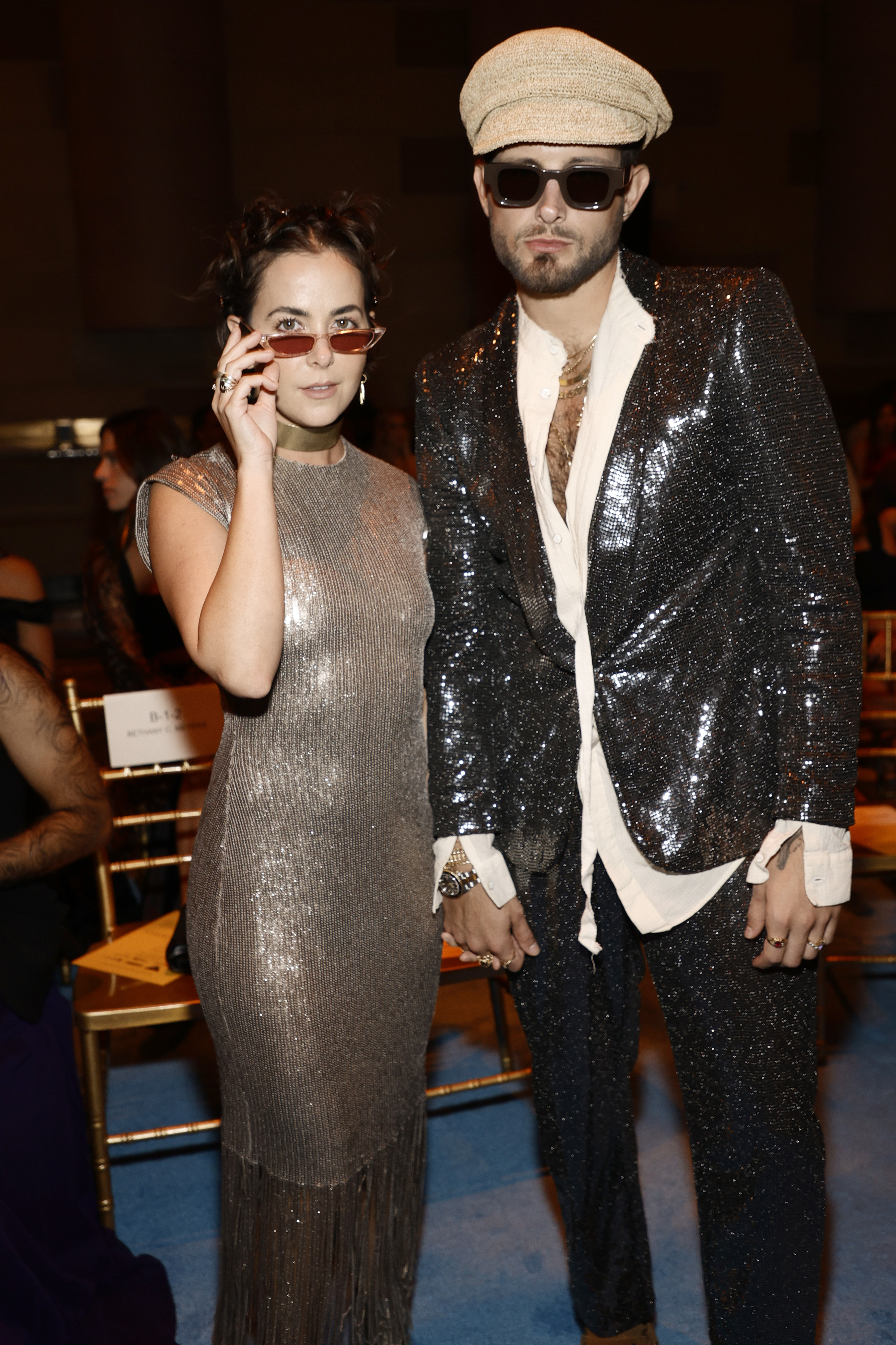 NEW YORK, NEW YORK - SEPTEMBER 07: Bethany C. Meyers and Nico Tortorella attend front row for the Christian Siriano SS2022 Fashion Show at Gotham Hall on September 07, 2021 in New York City. (Photo by Jamie McCarthy/Getty Images for Christian Siriano)