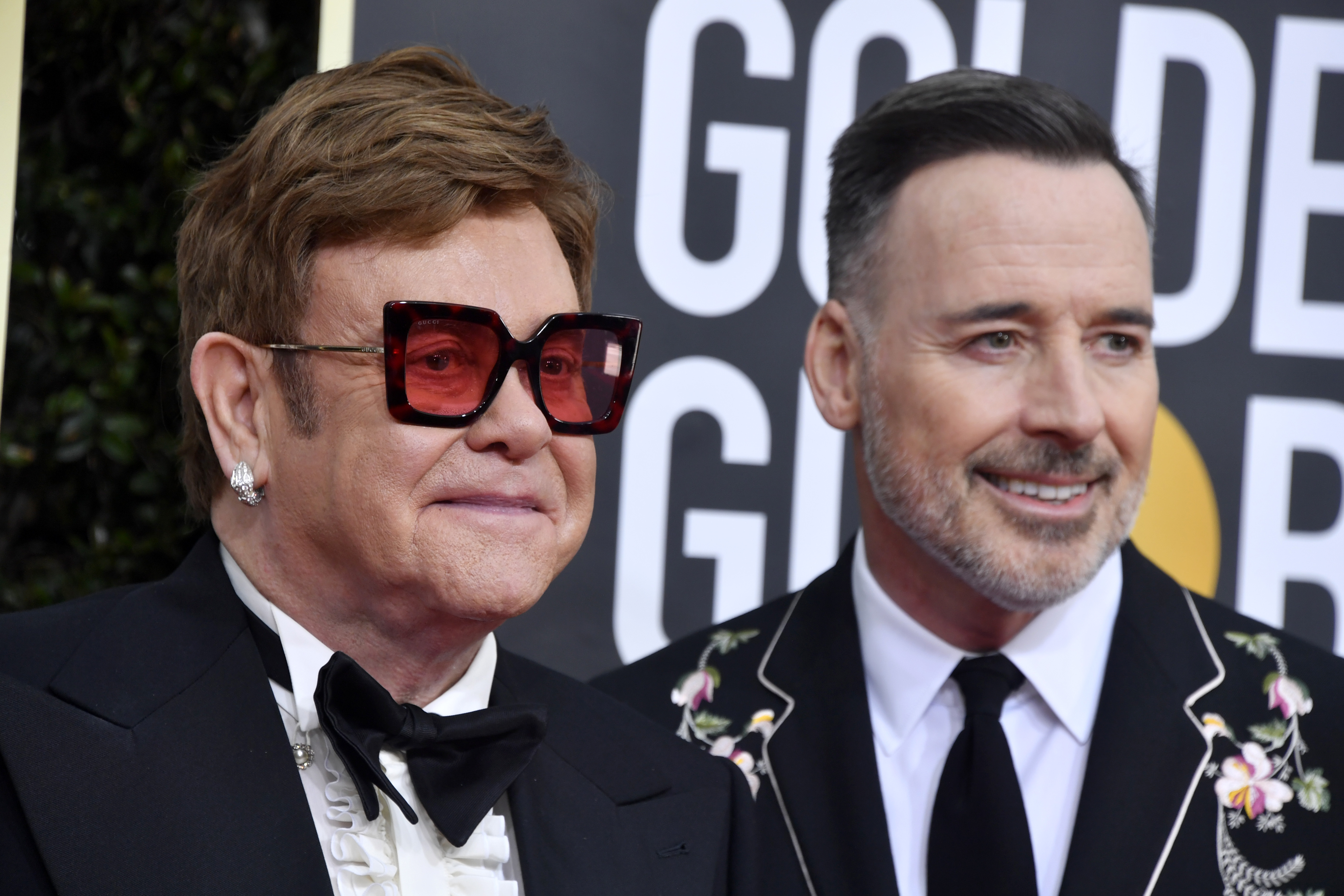 BEVERLY HILLS, CALIFORNIA - JANUARY 05: (L-R) Elton John and David Furnish attend the 77th Annual Golden Globe Awards at The Beverly Hilton Hotel on January 05, 2020 in Beverly Hills, California. (Photo by Frazer Harrison/Getty Images)