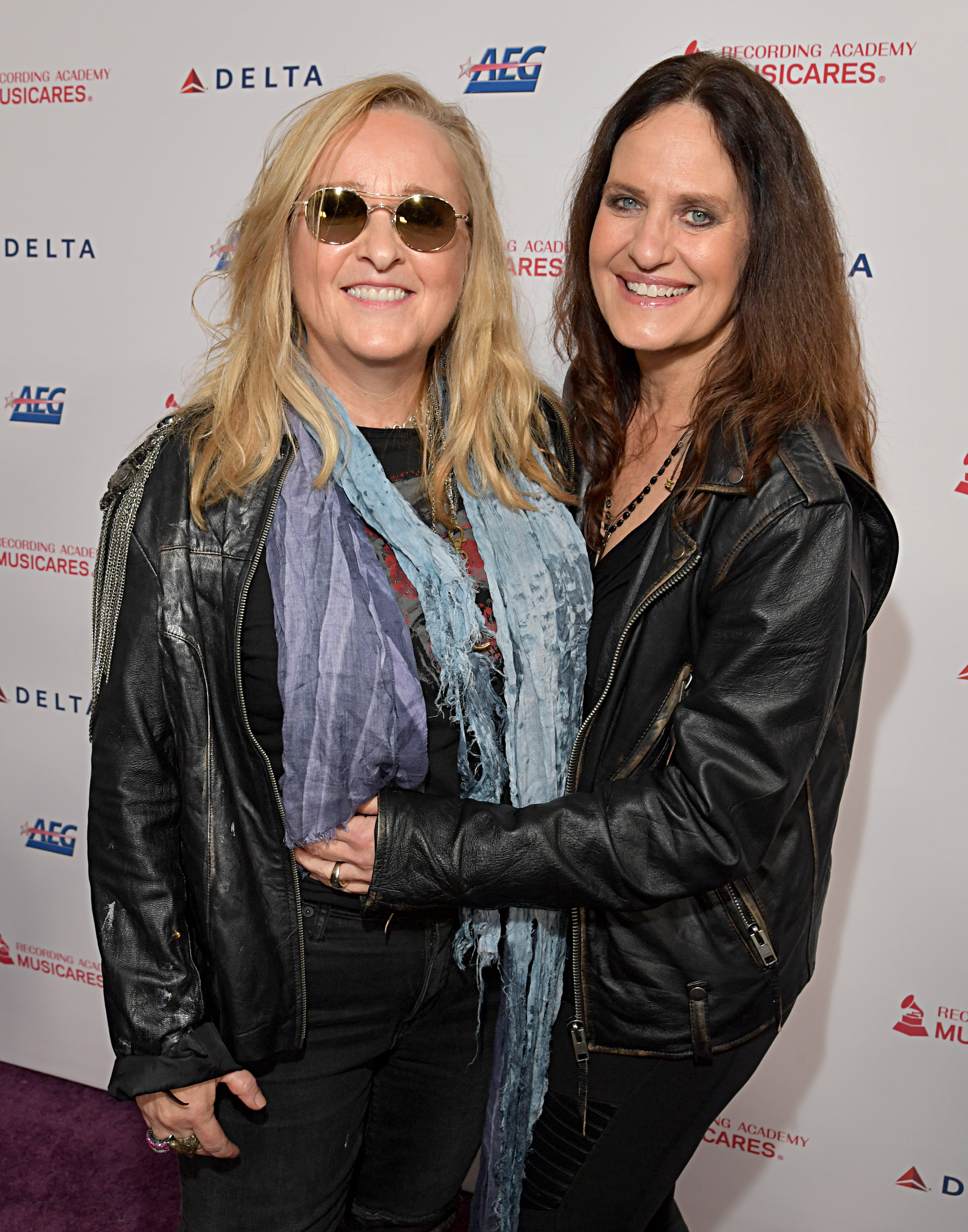 LOS ANGELES, CALIFORNIA - JANUARY 24: (L-R) Melissa Etheridge and Linda Wallem attend MusiCares Person of the Year honoring Aerosmith at West Hall at Los Angeles Convention Center on January 24, 2020 in Los Angeles, California. (Photo by Lester Cohen/Getty Images for The Recording Academy )