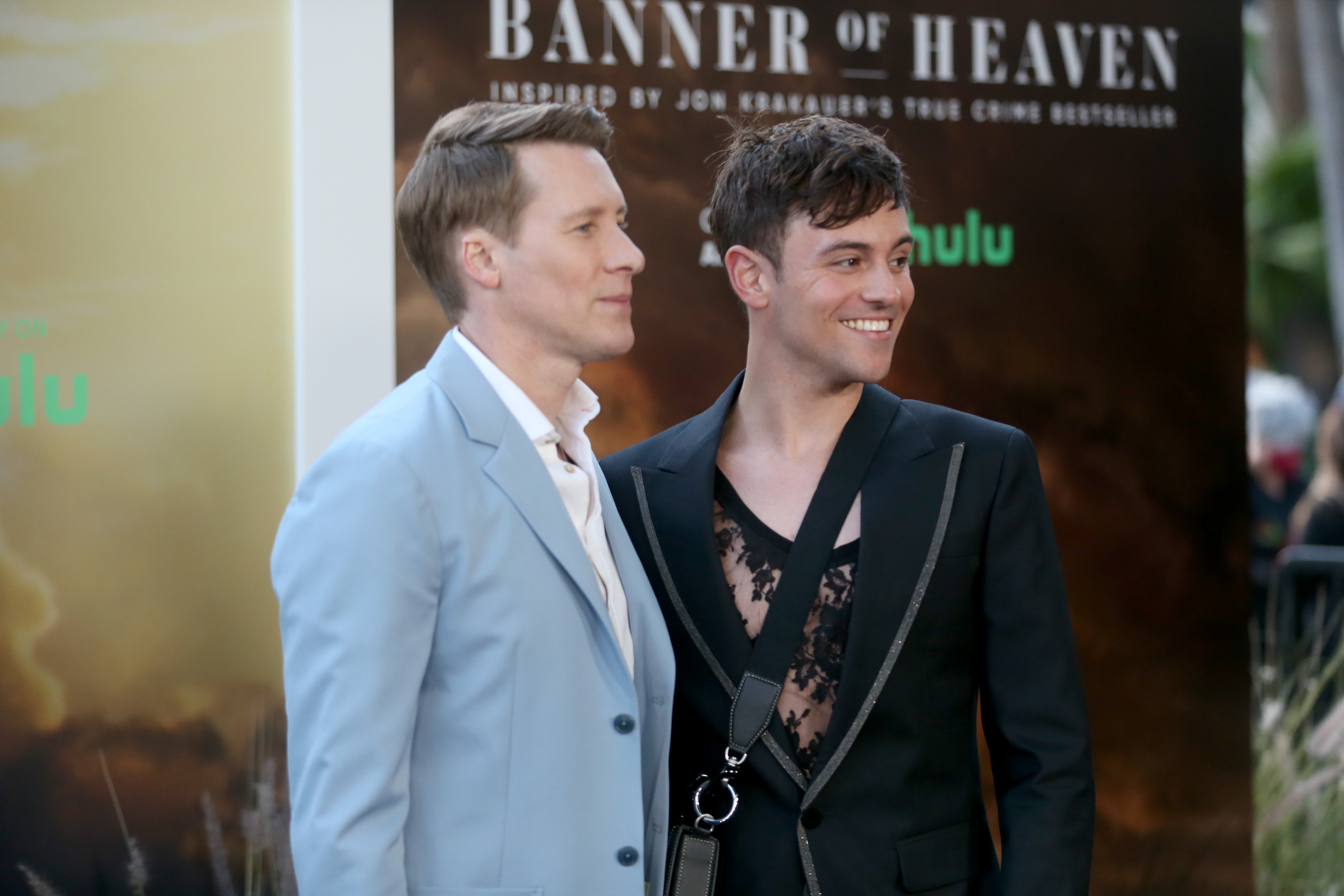 HOLLYWOOD, CALIFORNIA - APRIL 20: (L-R) Dustin Lance Black and Tom Daley attend the premiere of FX