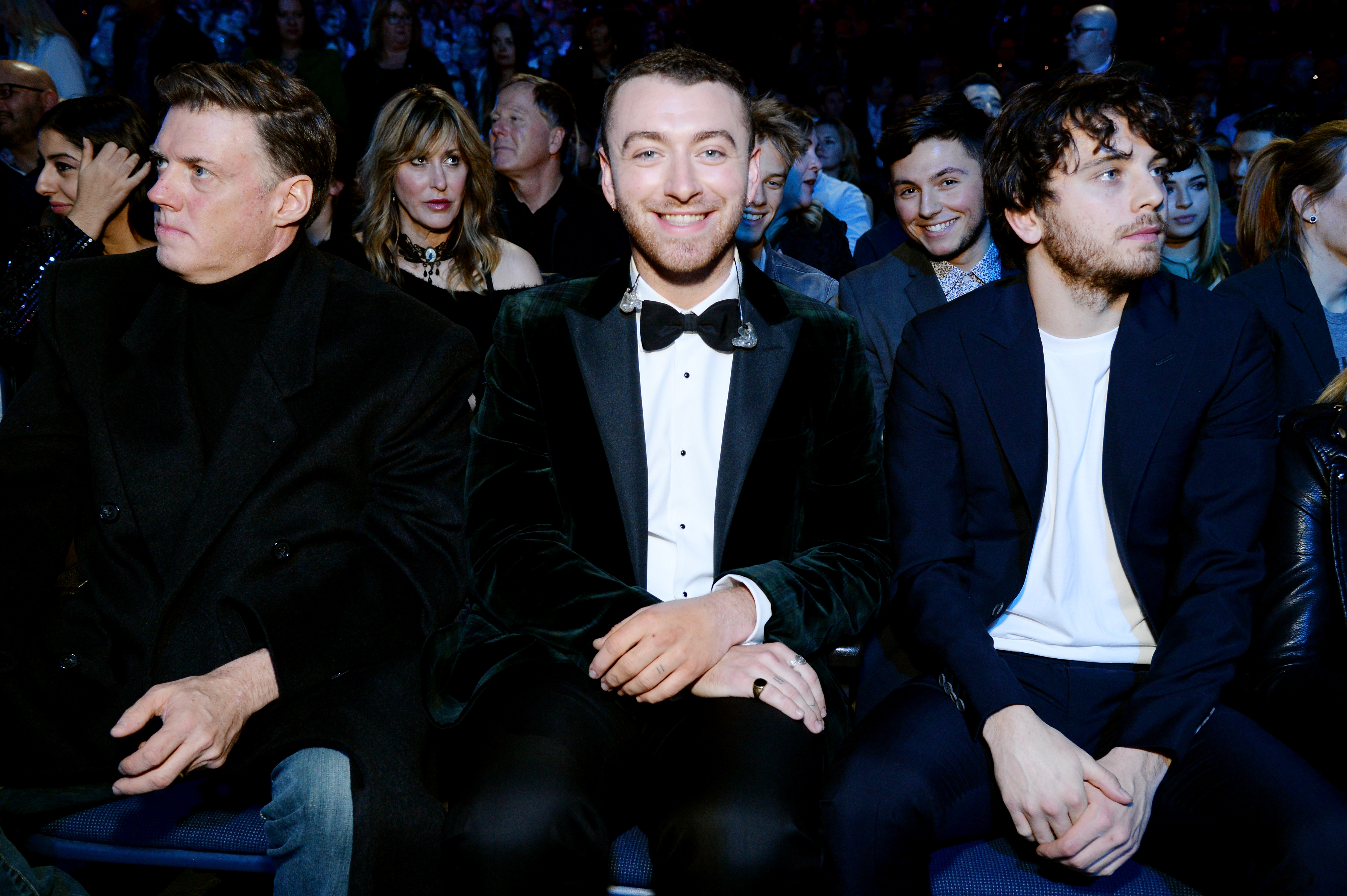 NEW YORK, NY - JANUARY 30:  Recording artist Sam Smith (C) and actor Brandon Flynn (R) attend the 60th Annual GRAMMY Awards - I