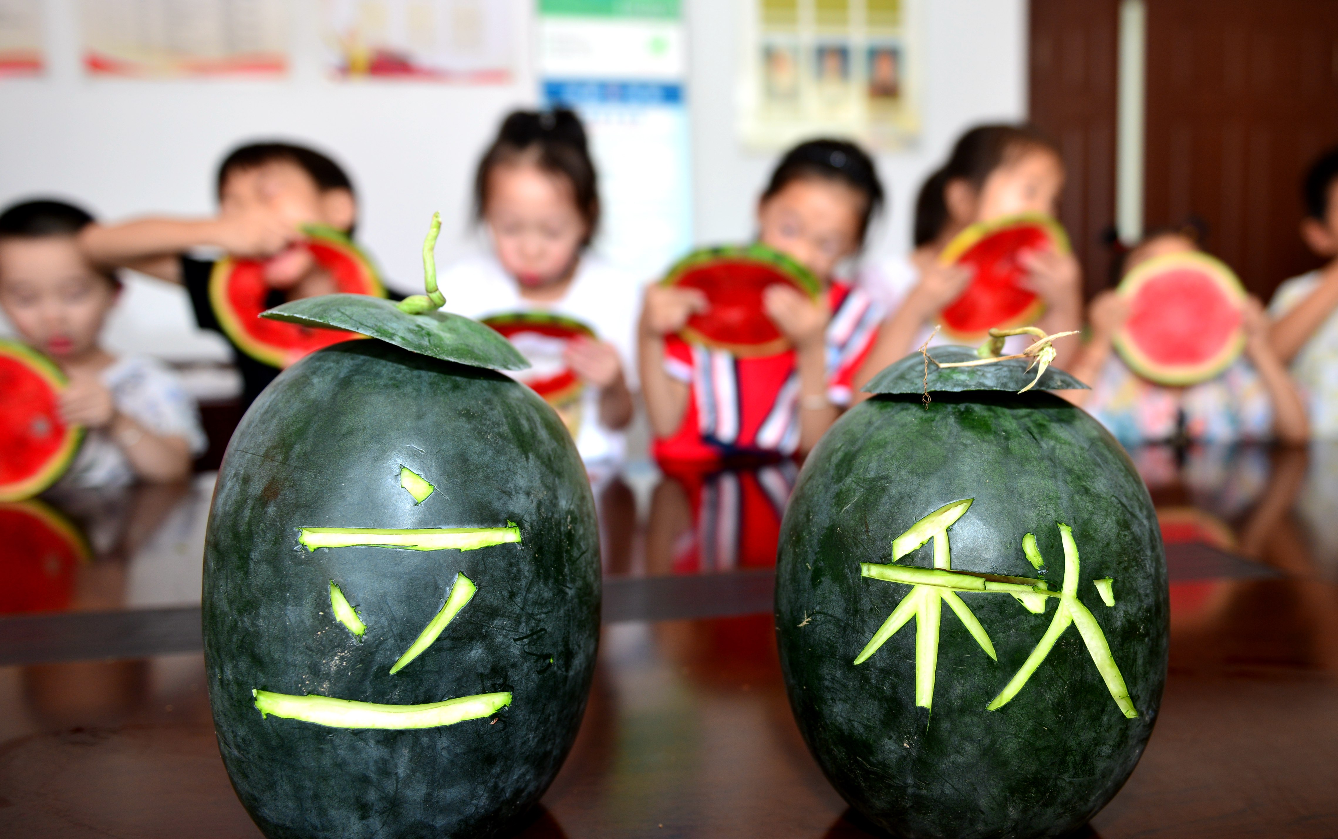 ZHEJIANG, CHINA - AUGUST 01: (CHINA MAINLAND OUT)Children are eating watermelon to welcom traditional solar term ¡°autumn begins¡± in Hangzhou,Zhejiang,China on 06th August, 2019.(Photo by TPG/Getty Images)
