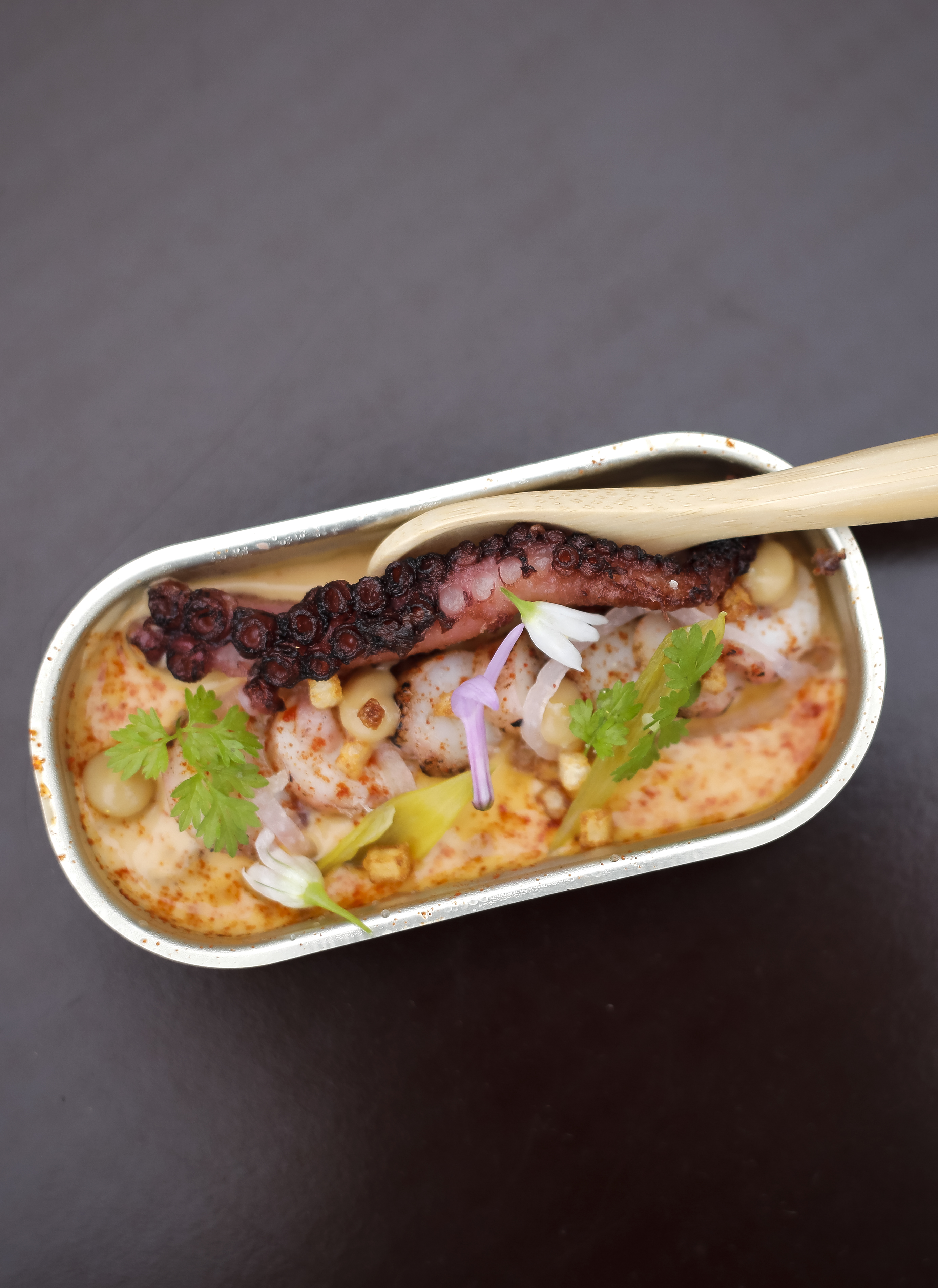 LOS ANGELES, CALIFORNIA - MAY 08: Spanish octopus in escabeche with Uni cream served by The Bazaar and Otono at the
