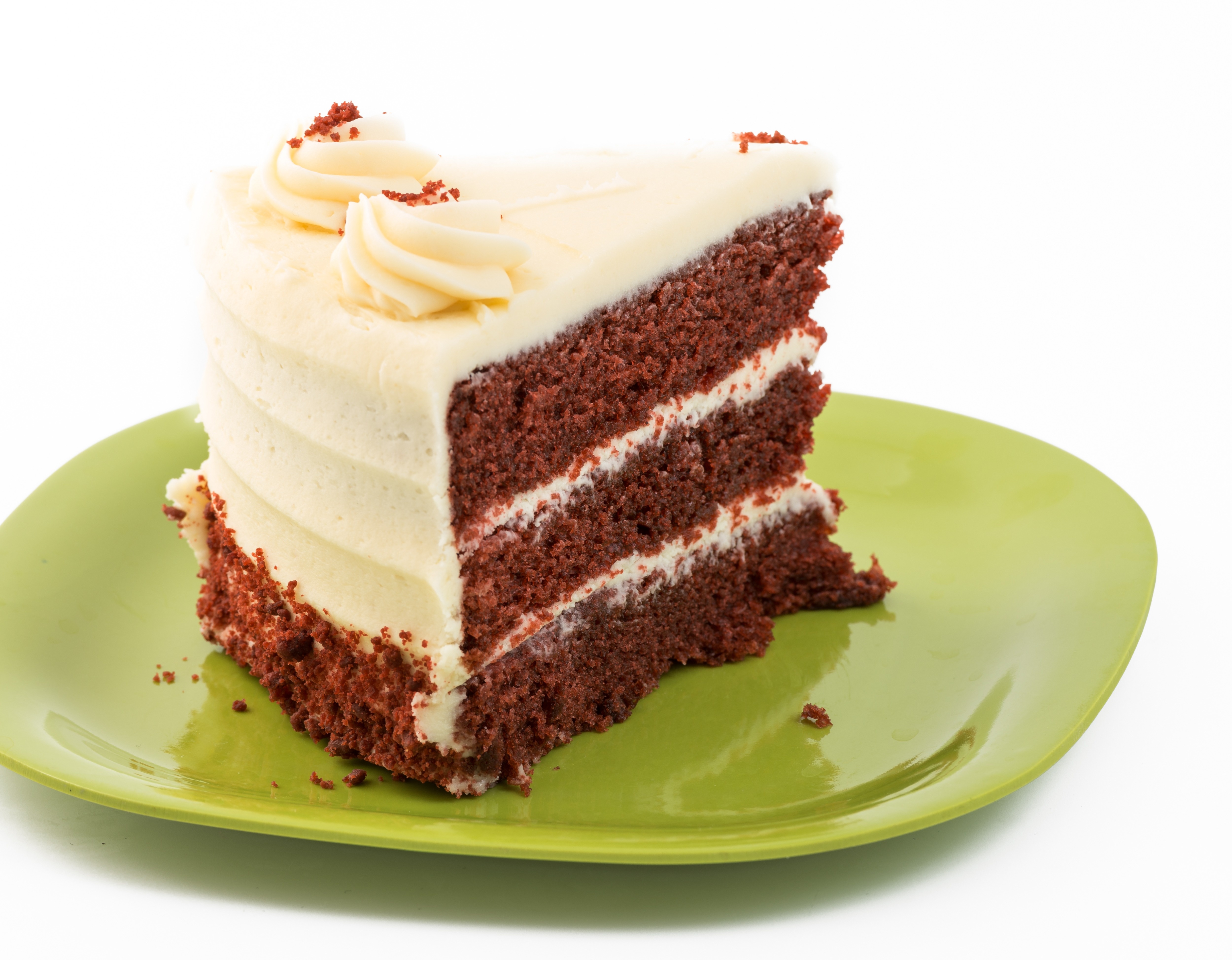 TORONTO, CANADA - 2014/02/28: Large Slice of Red Velvet Cake served in a green plastic plate. (Photo by Roberto Machado Noa/LightRocket via Getty Images)