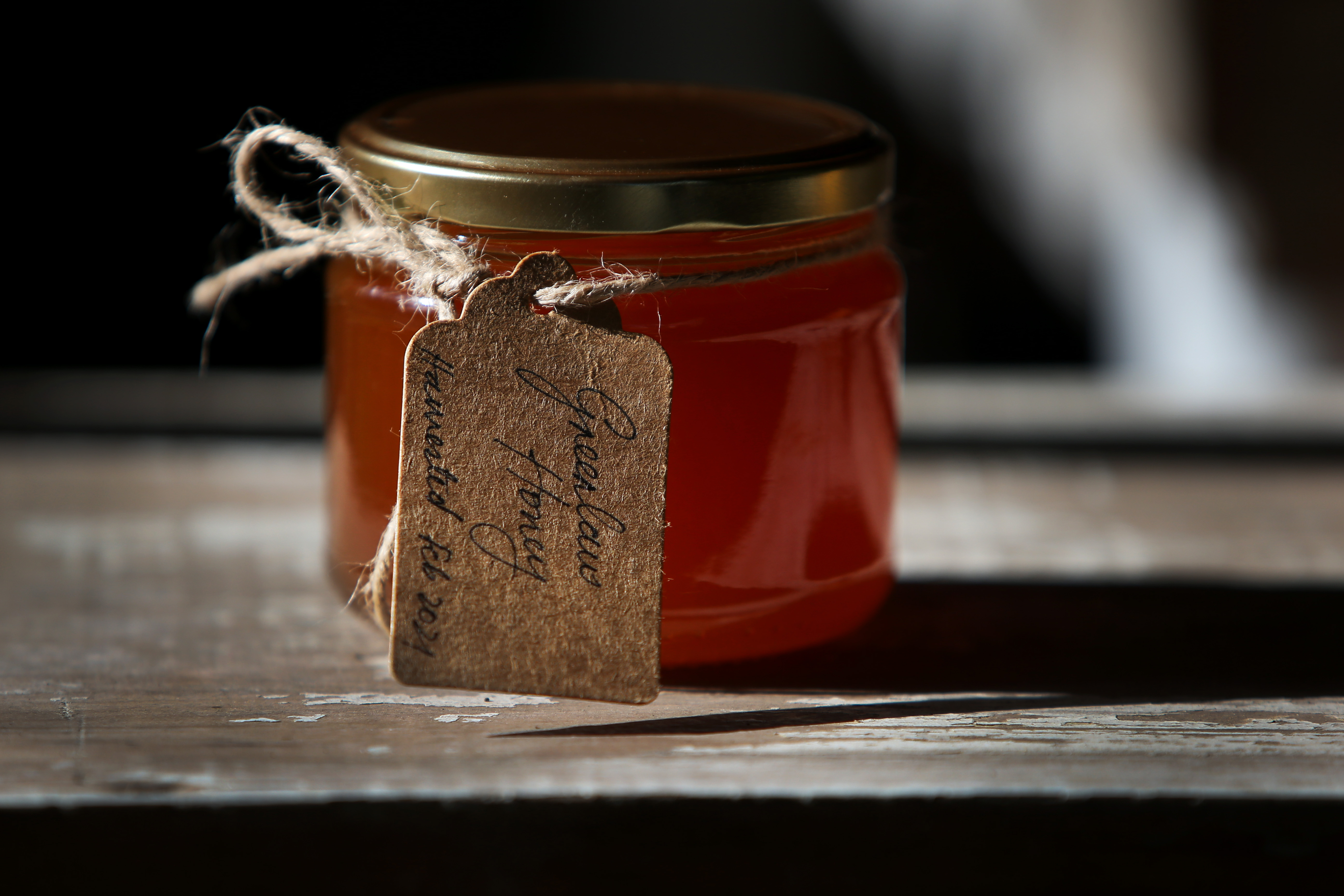 BOWRAL, AUSTRALIA - MAY 17: Bottled honey collected by apiarist Darryn McKay of Bowral Bees is seen on display on May 17, 2021 in Bowral, Australia. Darryn is a