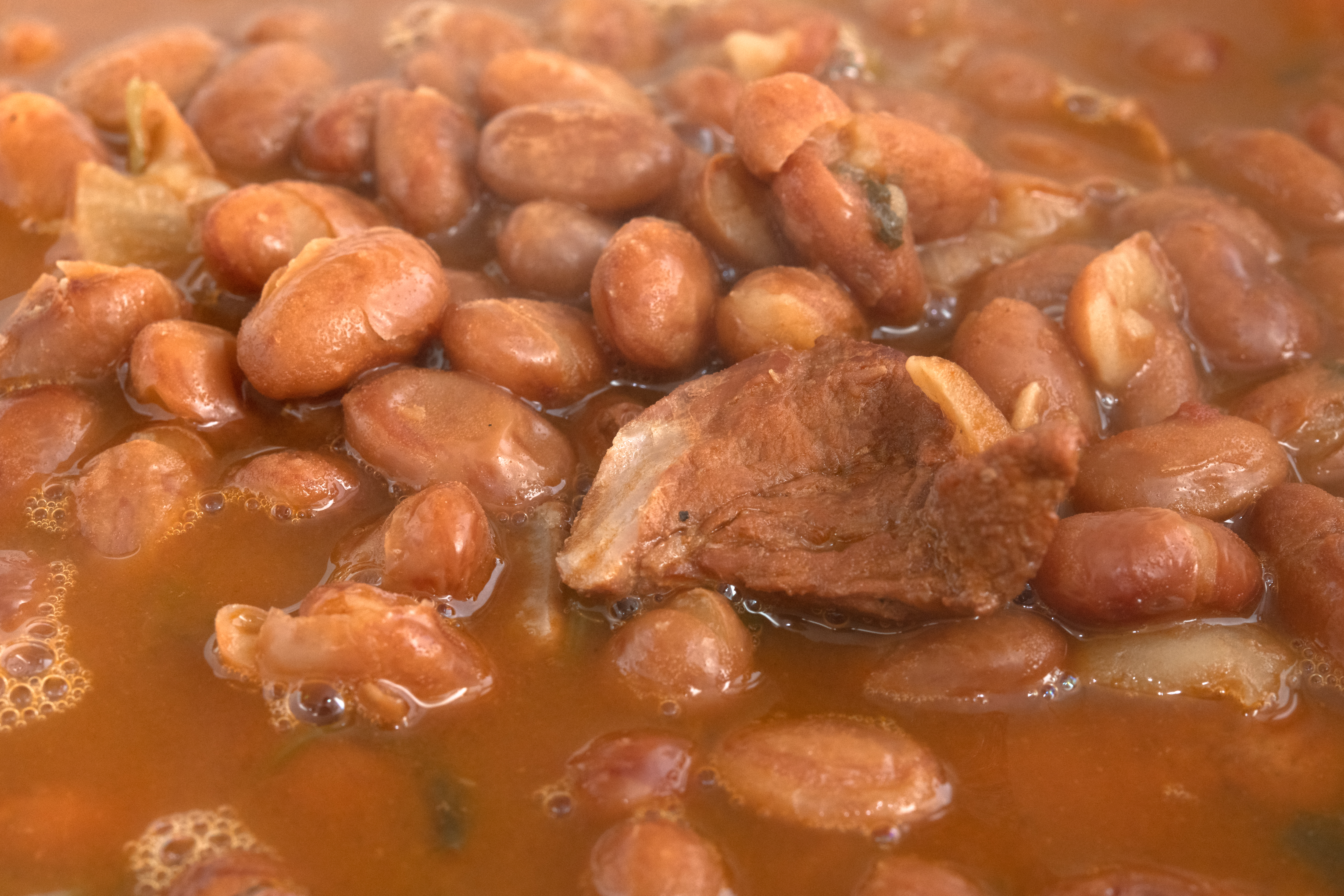 TORONTO, ONTARIO, CANADA - 2018/10/17: Close up of a hot red kidney beans soup. There is a small piece of pork meat in the food. (Photo by Roberto Machado Noa/LightRocket via Getty Images)