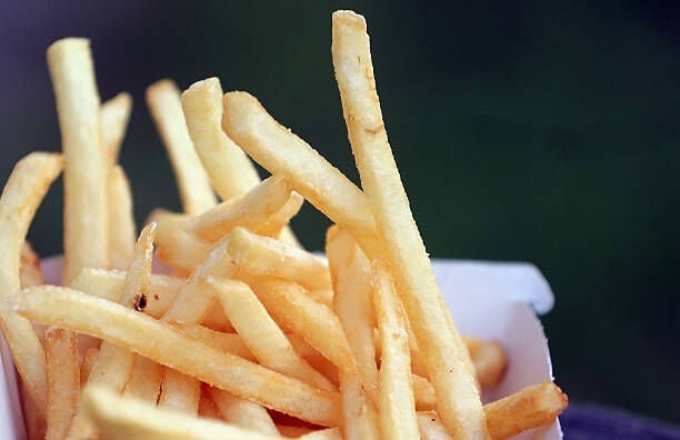 BRISTOL, ENGLAND - JANUARY 07:  French fries from a fast food outlet is seen on January 7, 2013 in Bristol, England.  A government-backed TV advert - made by Aardman, the creators of Wallace and Gromit - to promote healthy eating in England, is to be shown for the first time later today. England has one of the highest rates of obesity in Europe - costing the NHS 5 billion GDP each year - with currently over 60 percent of adults and a third of 10 and 11 year olds thought to be overweight or obese.  (Photo by Matt Cardy/Getty Images)