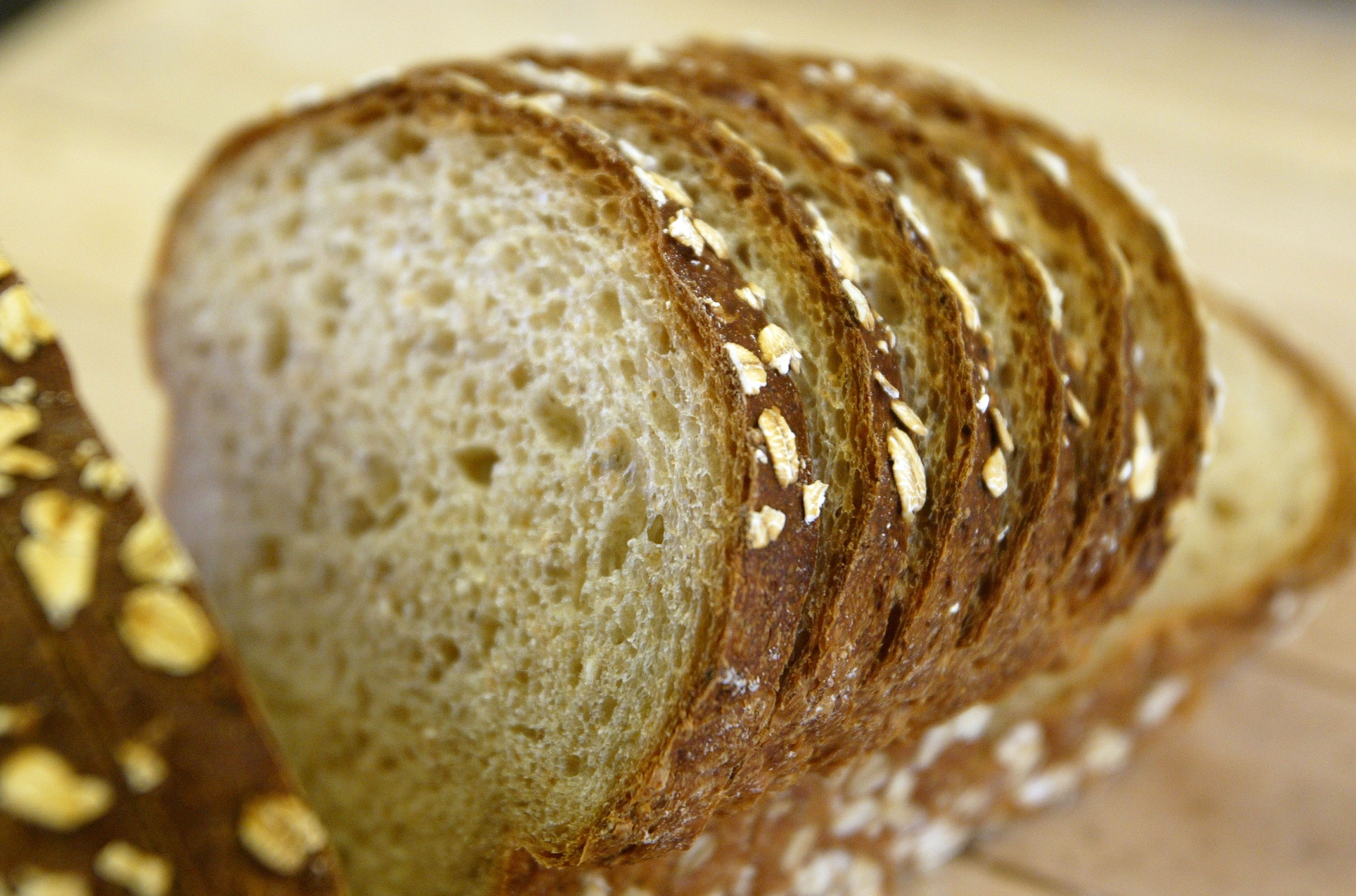 SAN FRANCISCO - NOVEMBER 21:  A loaf of sliced wheat bread is seen on the shelf at the Noe Valley Bakery and Bread Co. November 21, 2003 in San Francisco, California. The popularity of Atkins-style, low carbohydrate diets has contributed to the drop in consumption of bread in the U.S. over the past year as 40 percent of Americans ate less than in 2002.  (Photo by Justin Sullivan/Getty Images)  While industry leaders said The popularity of Atkins-style low-carbohydrate diets hasnt significantly affected sales for most bakers and suppliers, they said the trend may mean new ways of doing business.