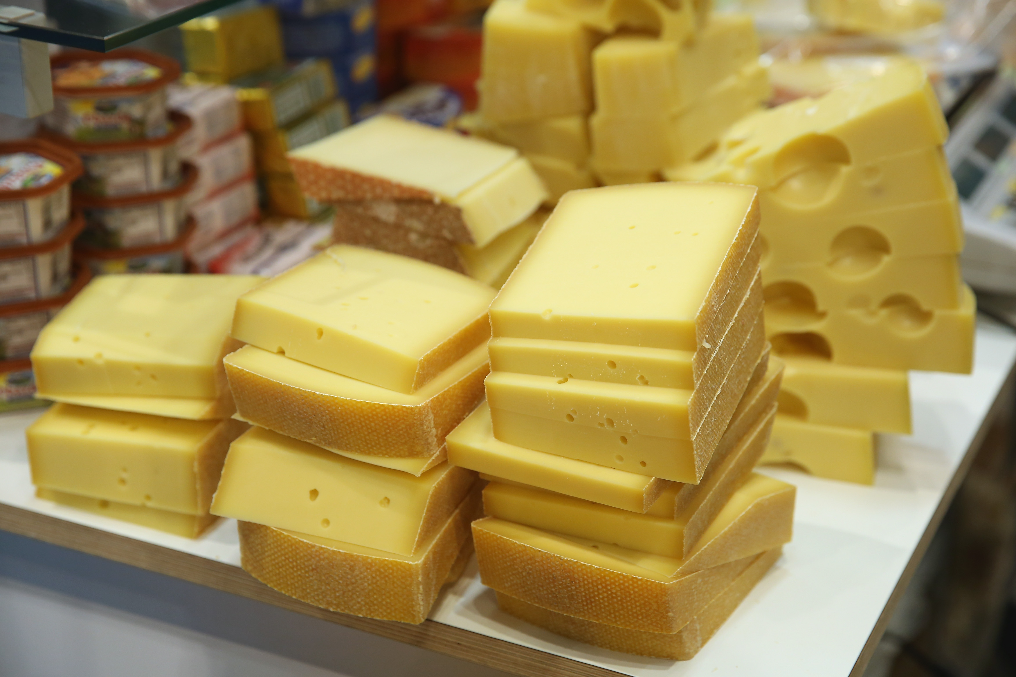 BERLIN, GERMANY - JANUARY 16:  Alpine mountain cheese awaits visitors at a stand at the International Green Week agricultural trade fair (Internationale Gruene Woche) on January 16, 2015 in Berlin, Germany. The International Green Week is the world