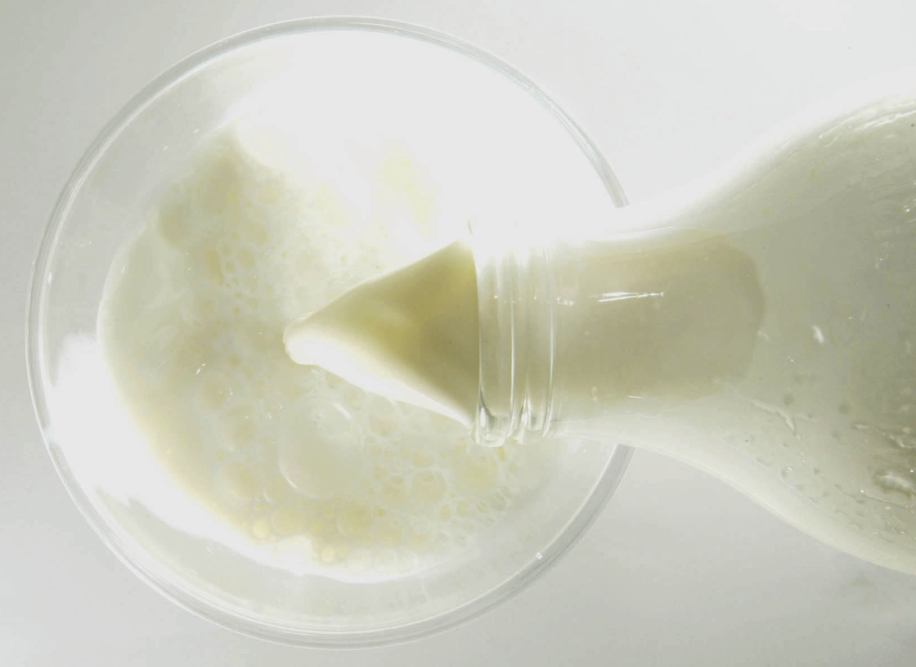 LONDON - DECEMBER 10:  This illustration shows milk being poured in to a glass on December 10, 2003 in London. Union members at Arla Foods, Europe