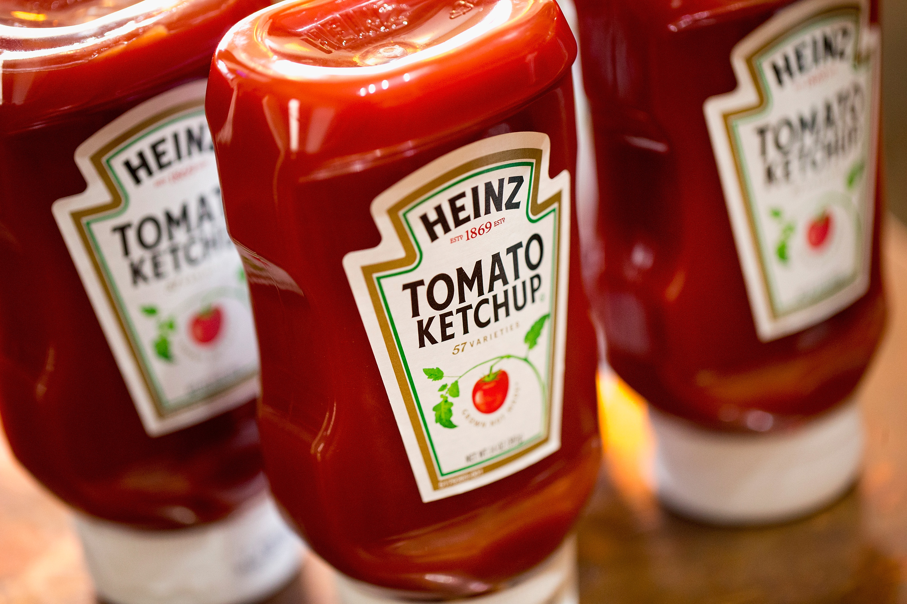 CHICAGO, IL - MARCH 25: In this photo illustration, Heinz Tomato Ketchup is shown on March 25, 2015 in Chicago, Illinois. Kraft Foods Group Inc. said it will merge with H.J. Heinz Co. to form the third largest food and beverage company in North America with revenue of about $28 billion.  (Photo Illustration by Scott Olson/Getty Images)