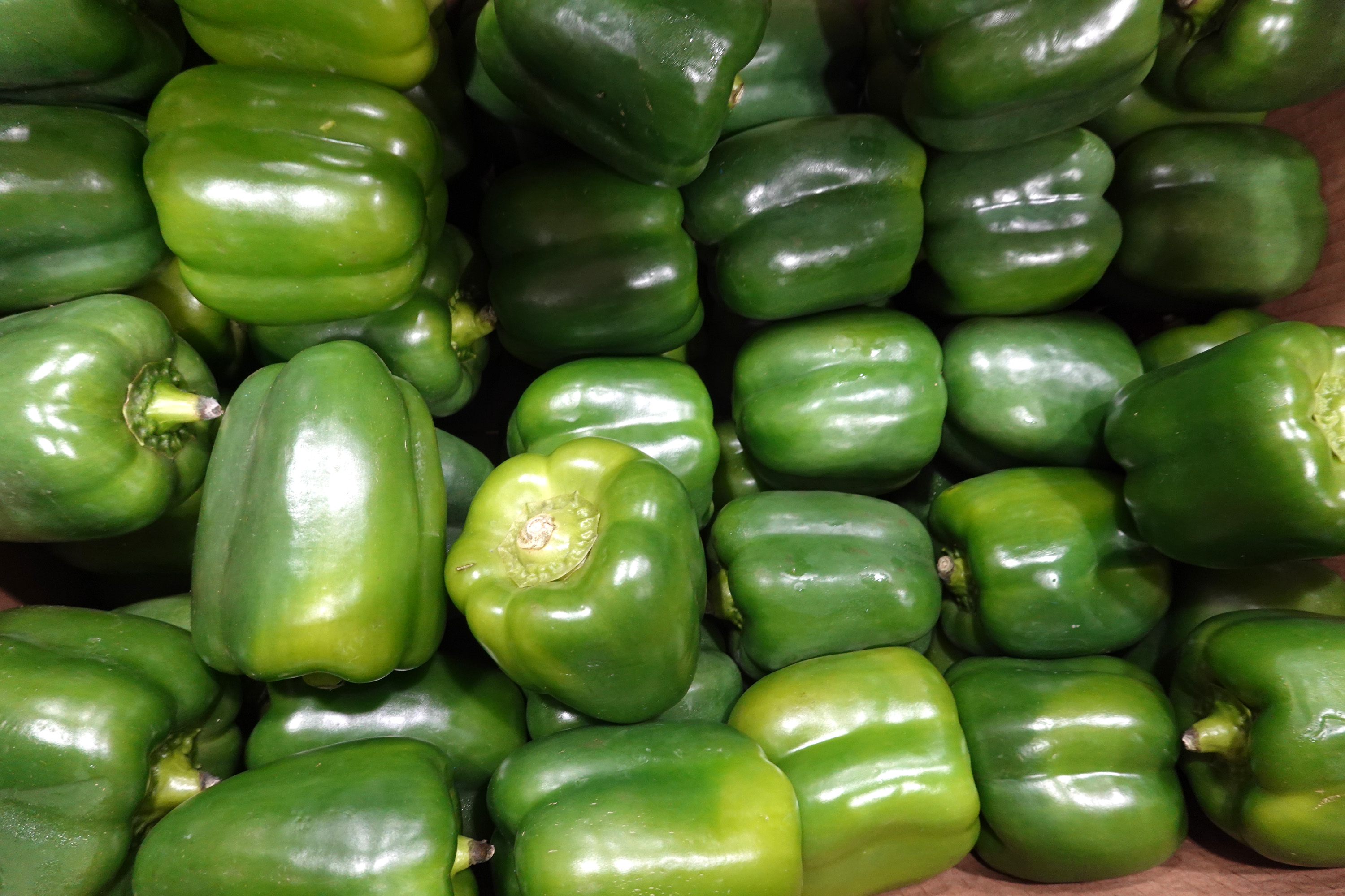 CHICAGO, ILLINOIS - MARCH 05: Bell peppers are prepared for distribution at the Greater Chicago Food Depository on March 05, 2021 in Chicago, Illinois. The Greater Chicago Food Depository supplies about 700 food pantries with food donations. The facility, which has seen a substantial increase in need since the start of the pandemic, distributes about 300,000 pounds of food each day.  As food prices continue to rise, the need from food pantries is expected to continue to grow. (Photo by Scott Olson/Getty Images)