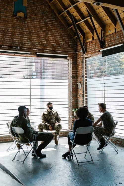 Photo of People Talking to One Another