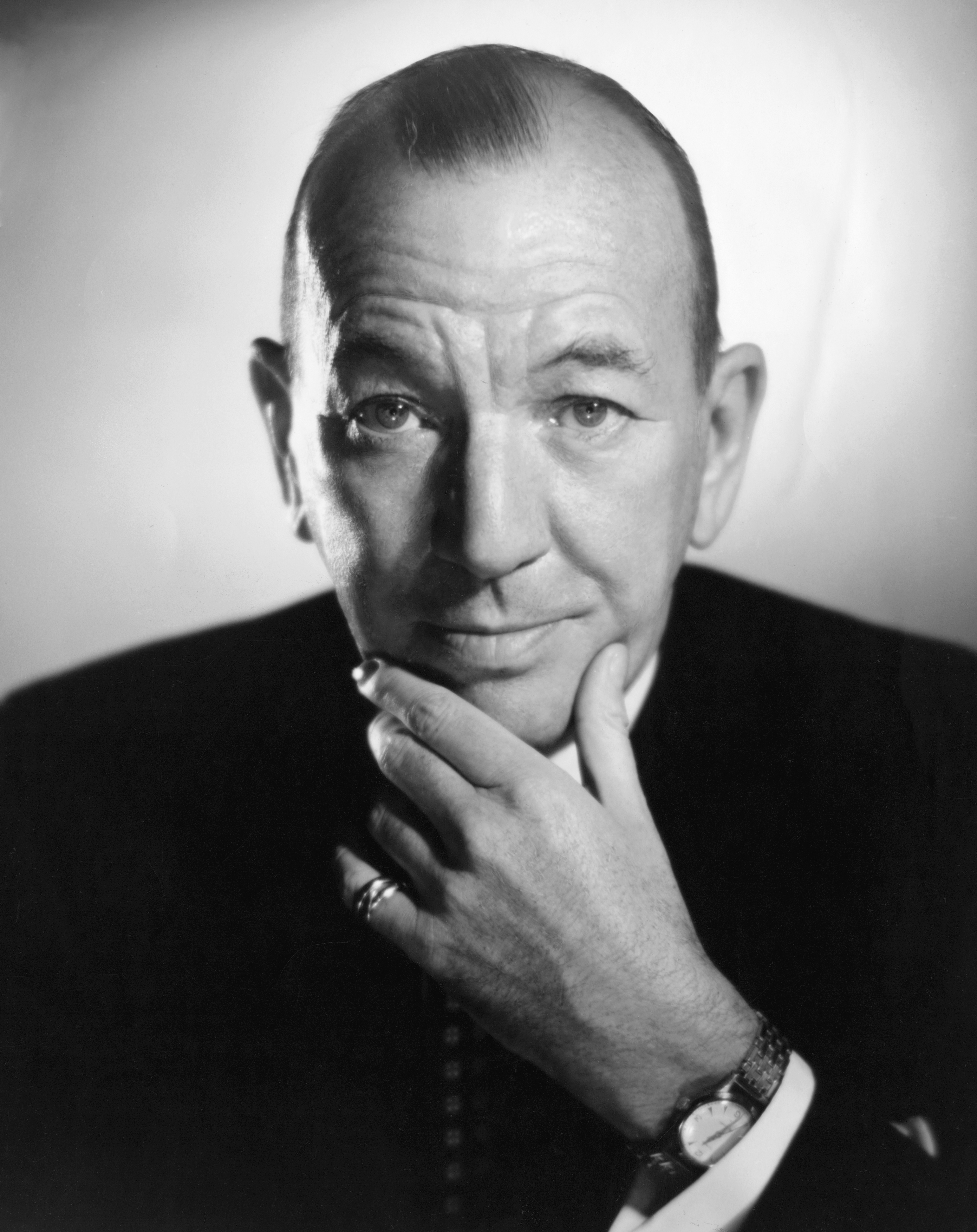 Head and shoulders portrait photo of British actor Noel Coward (1899-1973) with his hand massaging his chin. Ca. 1950. (Photo by �� John Springer Collection/CORBIS/Corbis via Getty Images)