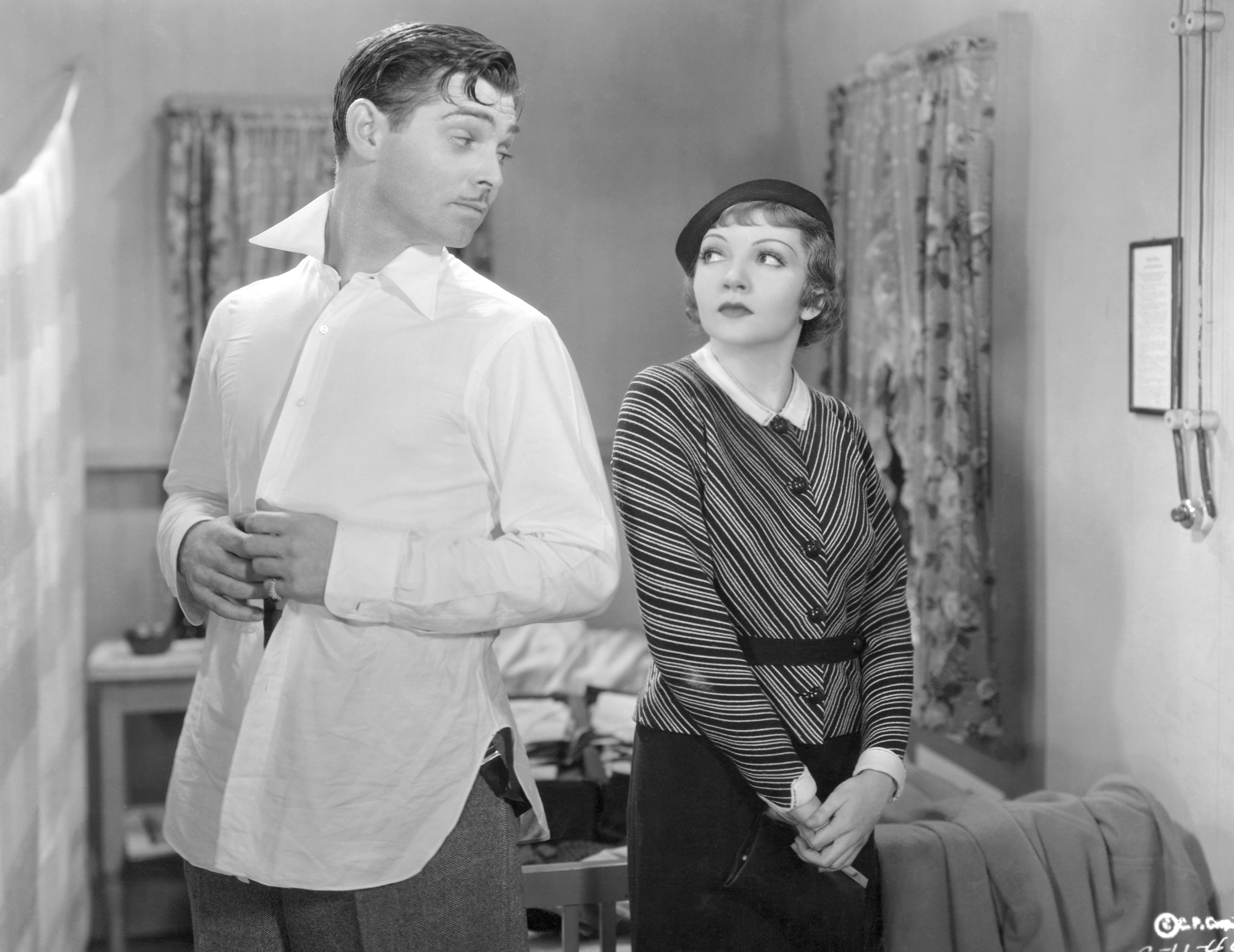 Actor Clark Gable and actress Claudette Colbert in a scene from Columbia Pictures