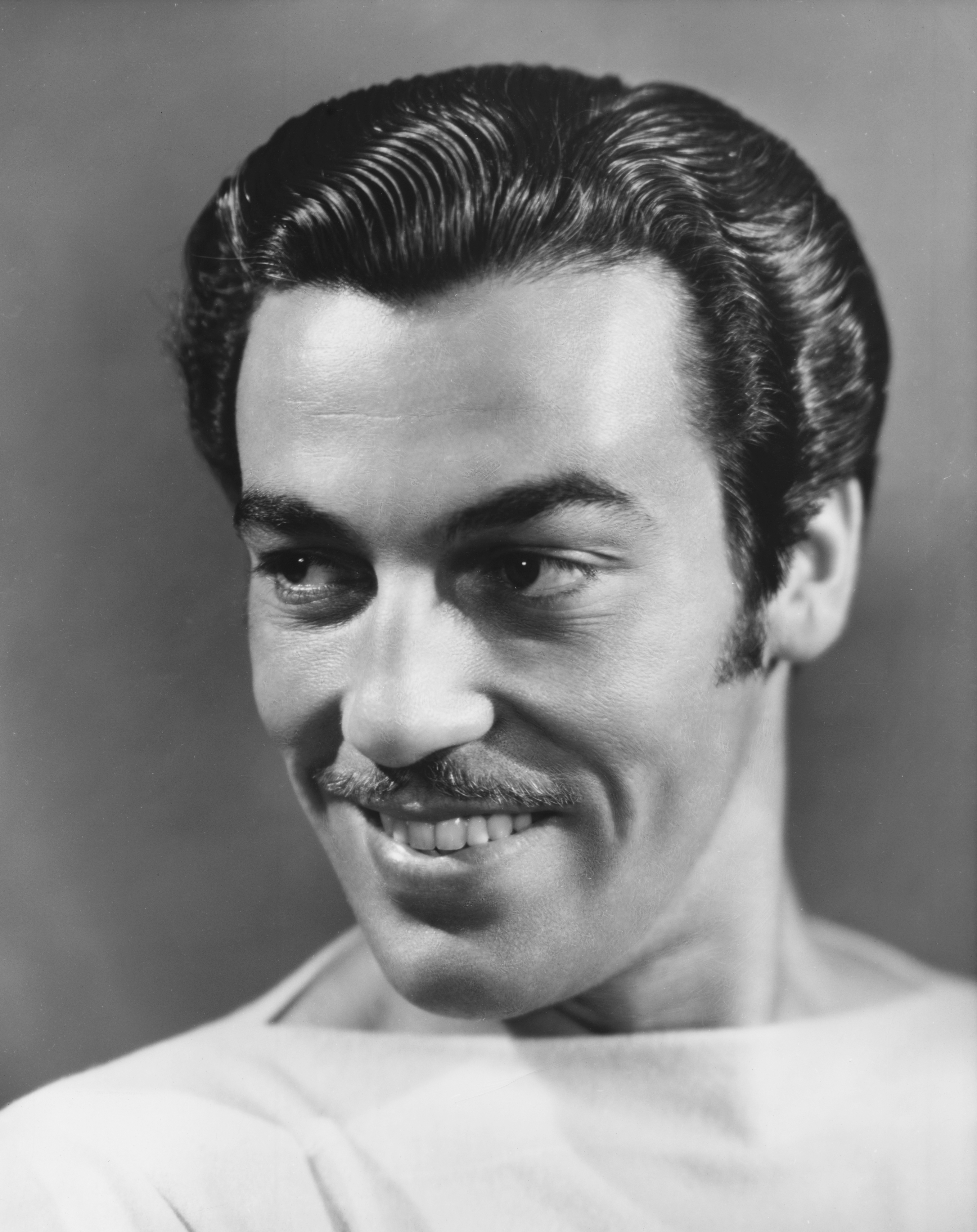 Actor Cesar Romero Smiling (Photo by �� John Springer Collection/CORBIS/Corbis via Getty Images)