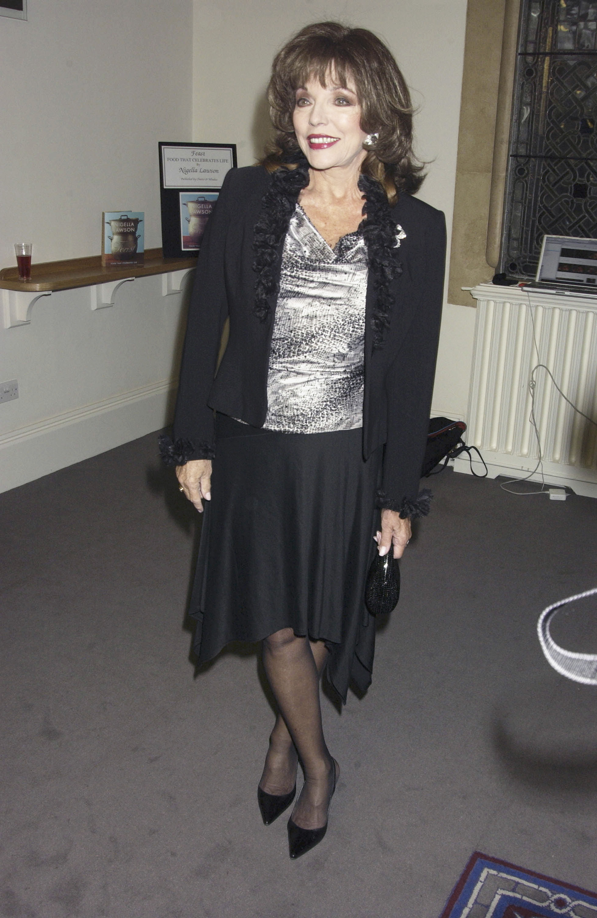 LONDON - OCTOBER 11: (EMBARGOED FOR PUBLICATION IN UK TABLOID NEWSPAPERS UNTIL 48 HOURS AFTER CREATE DATE AND TIME)  Actress Joan Collins attends the launch party celebrating the October release of
