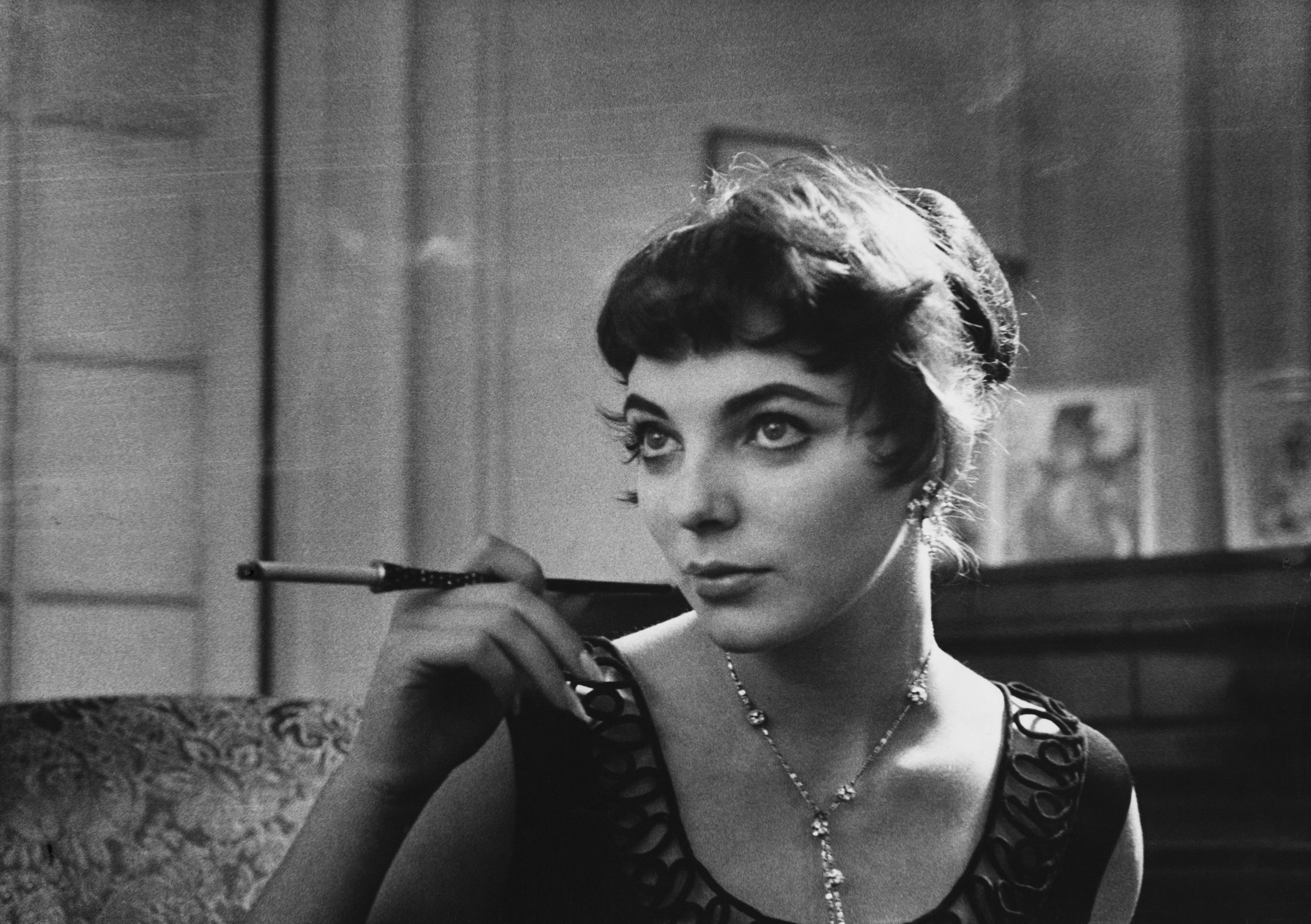 English actress Joan Collins, at the age of twenty-two, shortly after her return to England from Hollywood, in 1955. (Photo by © Hulton-Deutsch Collection/CORBIS/Corbis via Getty Images)