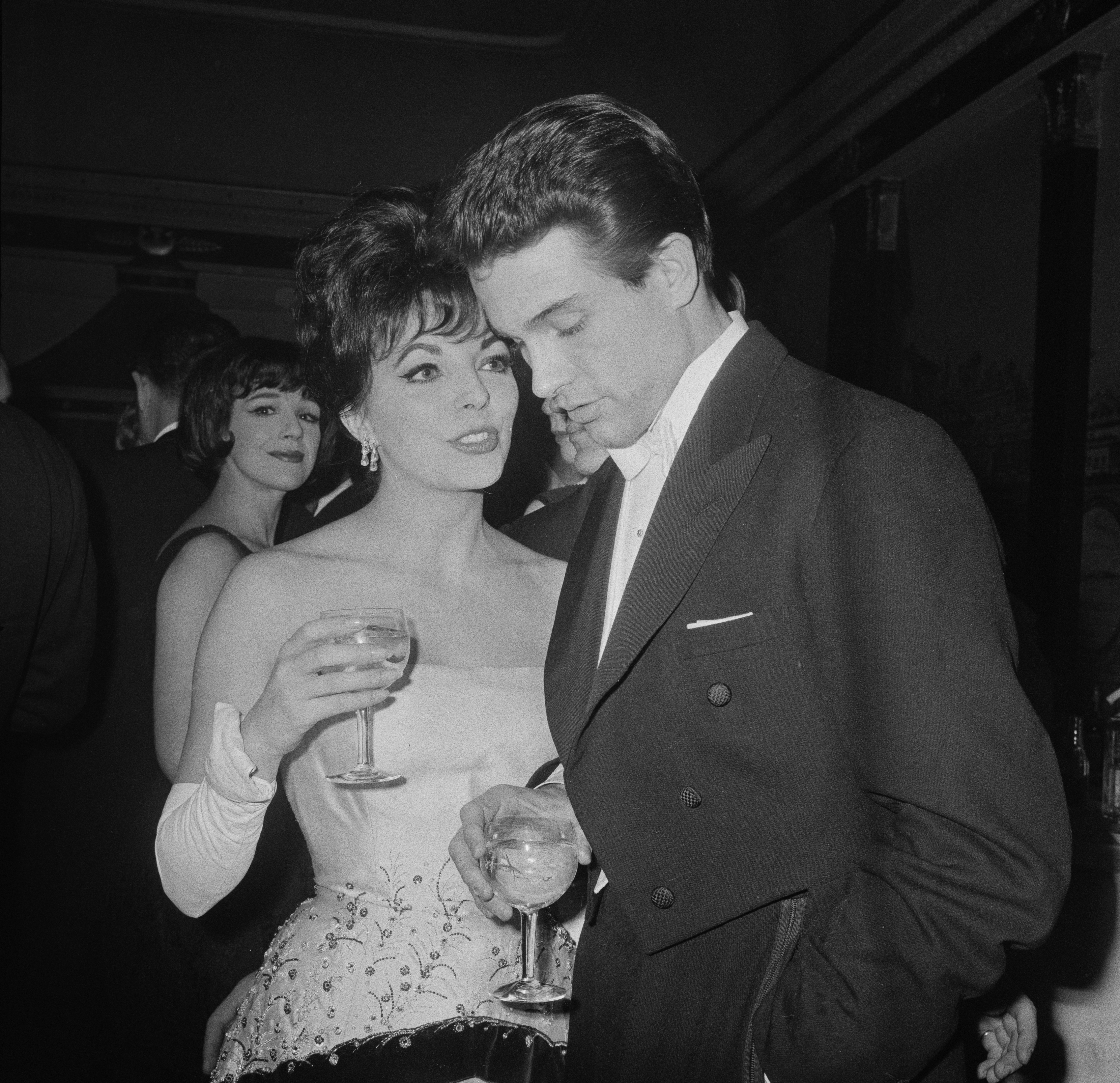 British actress Joan Collins and American actor Warren Beatty attend the London premiere of the film