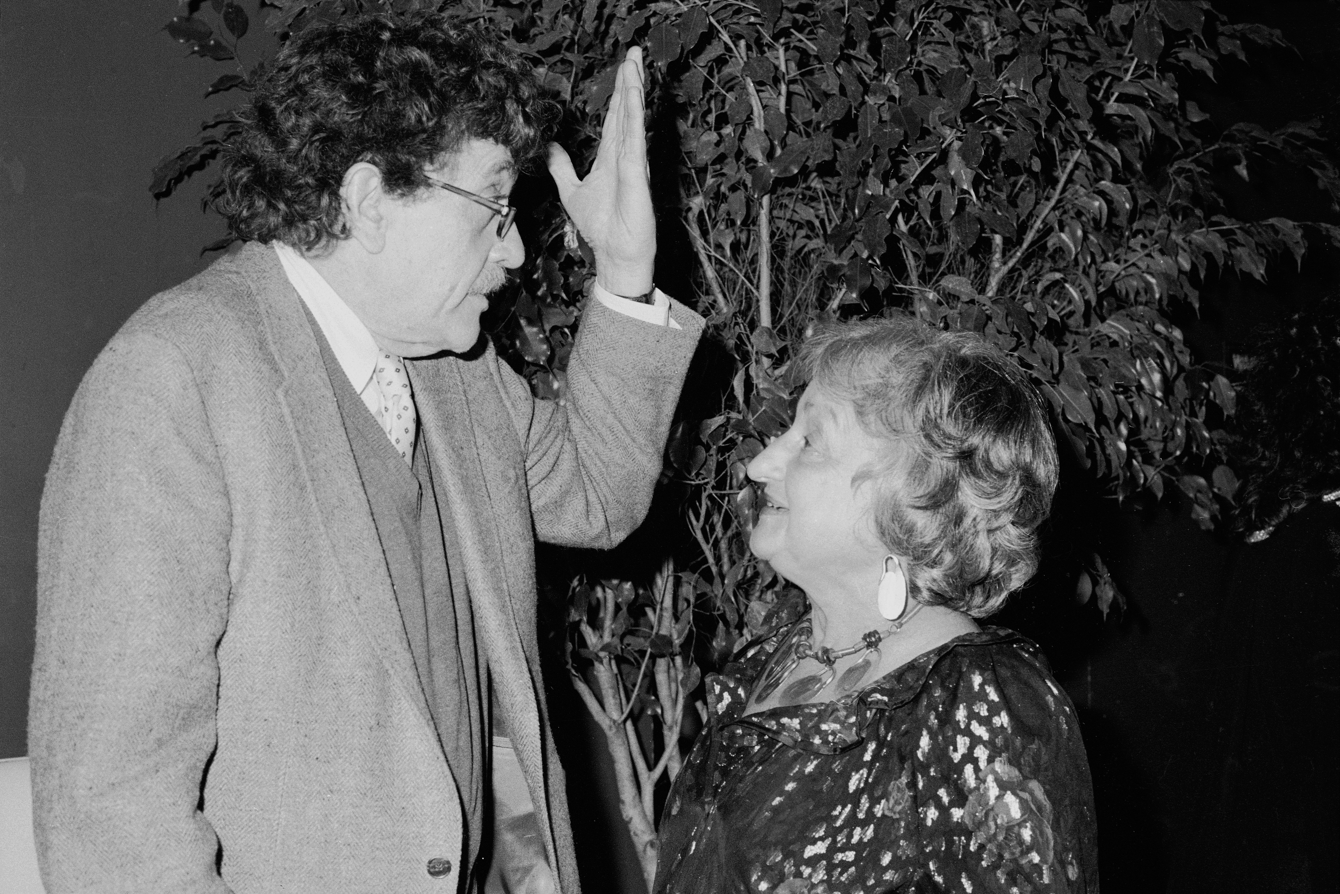 American author Kurt Vonnegut gestures with his hand as he talks to feminist author and social activist Betty Friedan (1921 - 2006), during Friedan