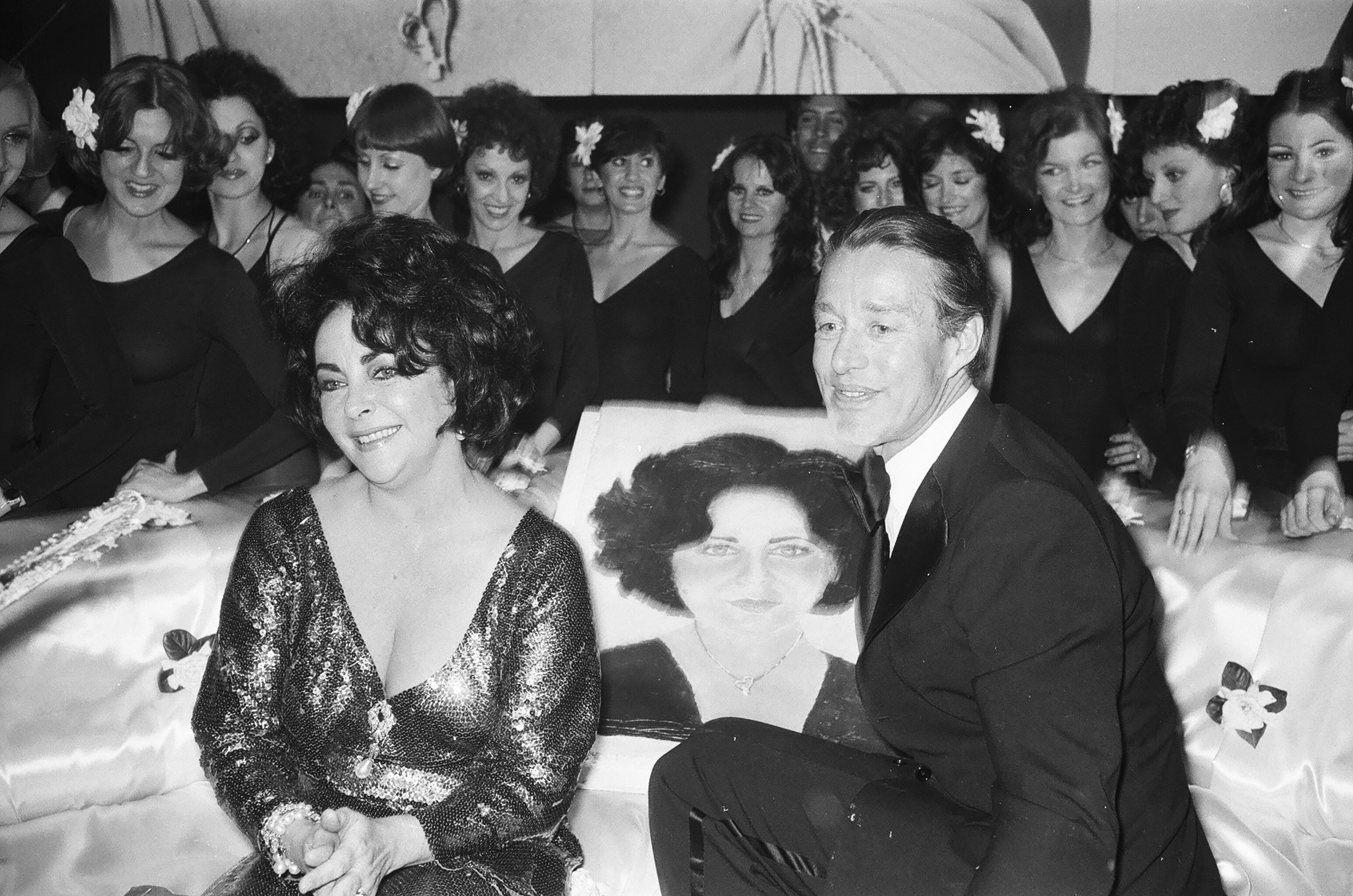 NEW YORK, NY - MARCH 1978: Elizabeth Taylor and Halston at her birthday party  at Studio 54, March 1978, in New York City.  (Photo by Sonia Moskowitz/Getty Images)