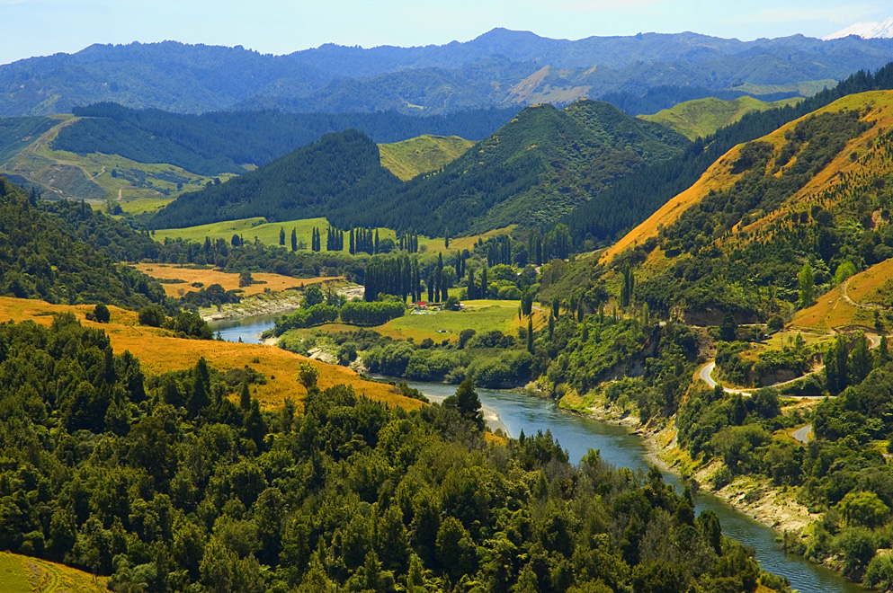 The Whanganui River. Mount Ruapehu can partly be seen at the top right of the scene. Photo credit