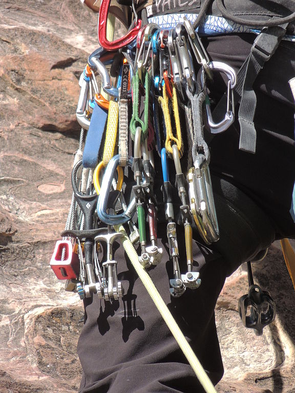 Climbing gear racked up on a harness