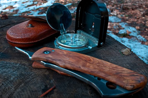 Folding knife and compass