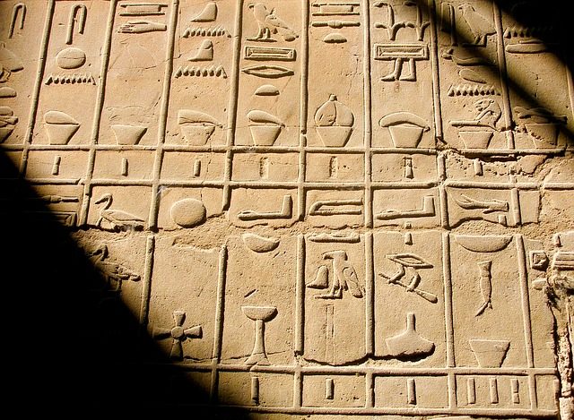 Hieroglyphics written on a board