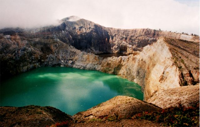 Crater lakes of Kelimutu at Flores Island, Indonesia Here’s the picture of the third lake. The picture was taken by Brocken Inaglory – Author: Mbz1 – CC BY-SA 3.0