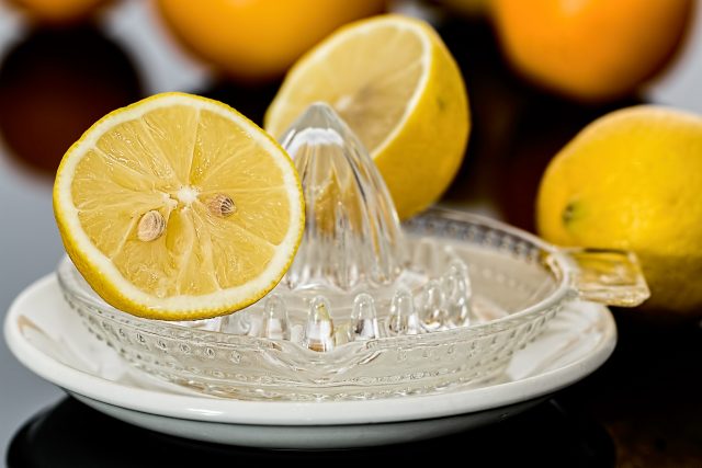 Lemon juice can help prevent the oil from soaking into the skin if applied early enough.