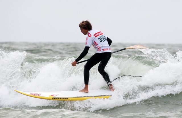 Stand-up paddleboarding is becoming increasingly popular in areas with good surf.  Photo Credit