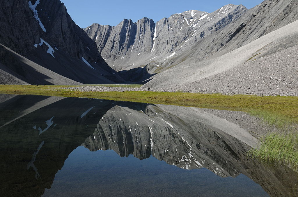 Small tarn in a hidden valley in the Itkillik Preserve, sometimes called the Yosemite of the Arctic. Gates of the Arctic National Park and Preserve