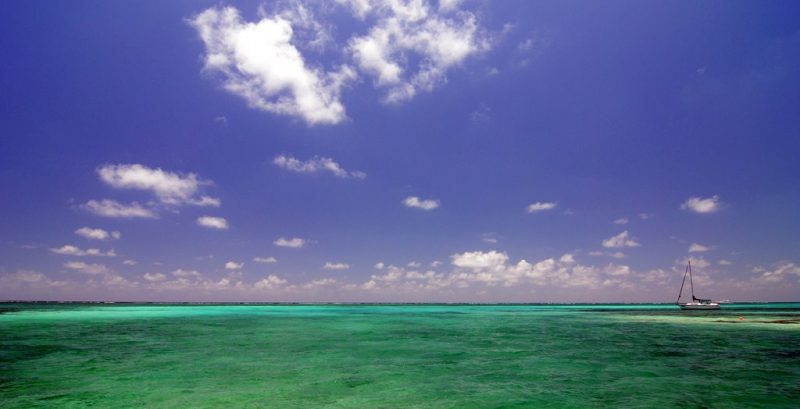 Azure Water off the coast of Ambergris Caye – Ken Douglas – CC-BY 2.0
