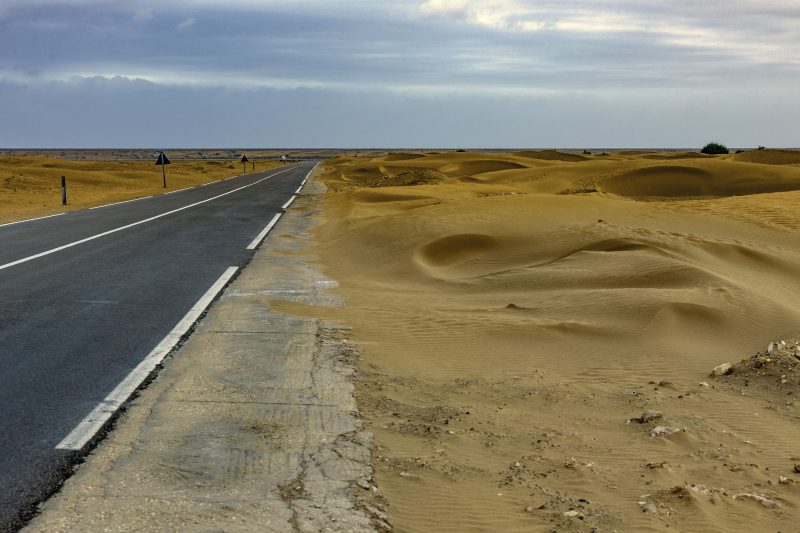 Road from Tan-Tan to Tarfaya before a storm, Morocco, North Africa