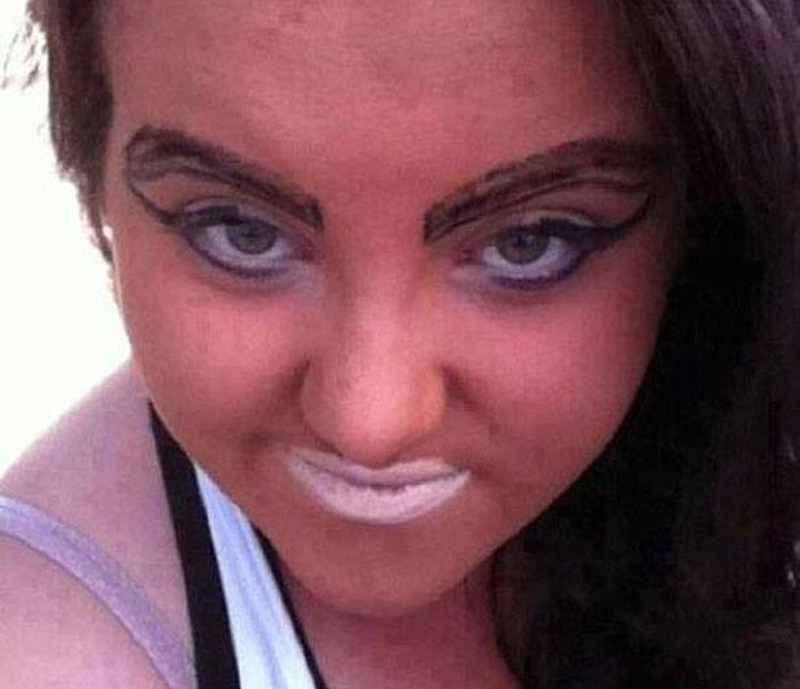 a woman with filled in brows