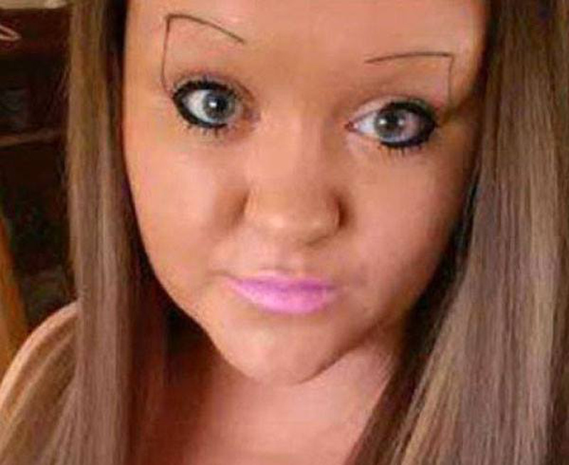 a woman with angled eyebrows