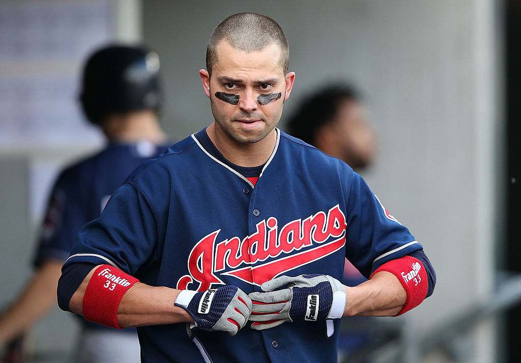 Nick Swisher #33 of the Cleveland Indians walks in the dugout after striking out in the sixth inning of the game against the Detroit Tigers at Comerica Park on June 8, 2013 in Detroit, Michigan. The Tigers defeated the Indians 6-4-170197637