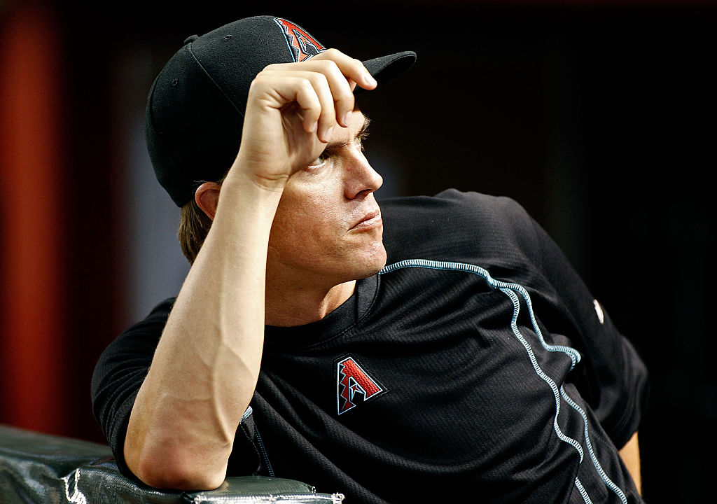 Zack Greinke #21 of the Arizona Diamondbacks looks on from the dugout before the start of a MLB game against the Los Angeles Dodgers at Chase Field on July 15, 2016 in Phoenix, Arizona-577815832