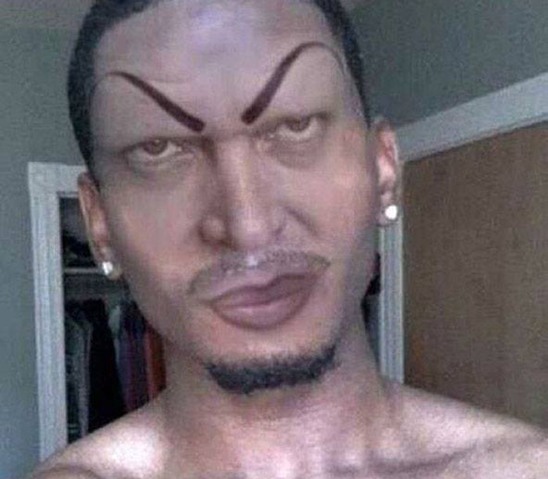 a man with evil eyebrows